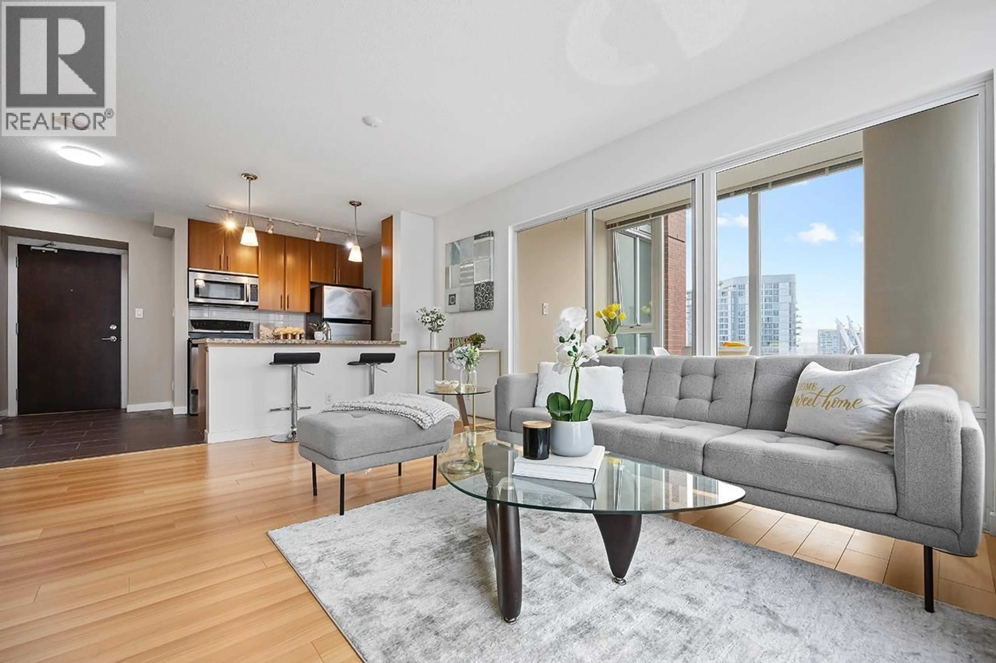 Living room with furniture, wood/laminate floor for 2806 - 688 ABBOTT STREET, Vancouver British Columbia V6B0B9