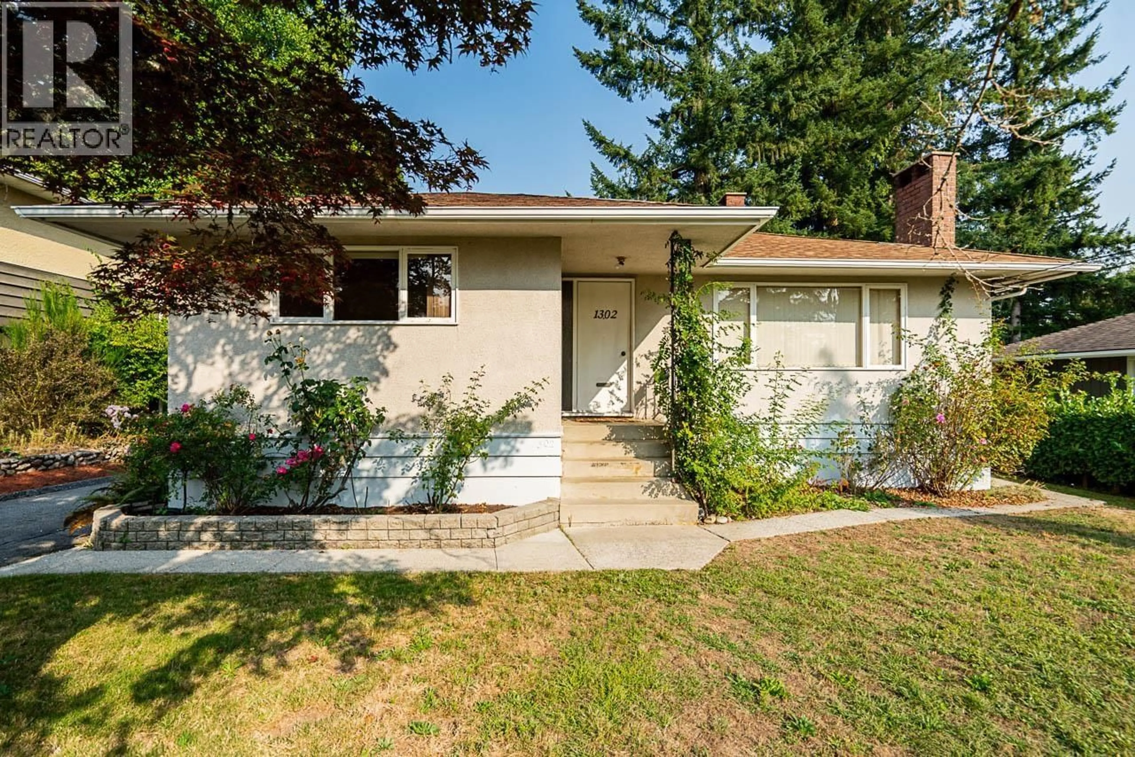 Home with vinyl exterior material, street for 1302 LENNOX STREET, North Vancouver British Columbia V7H1X3