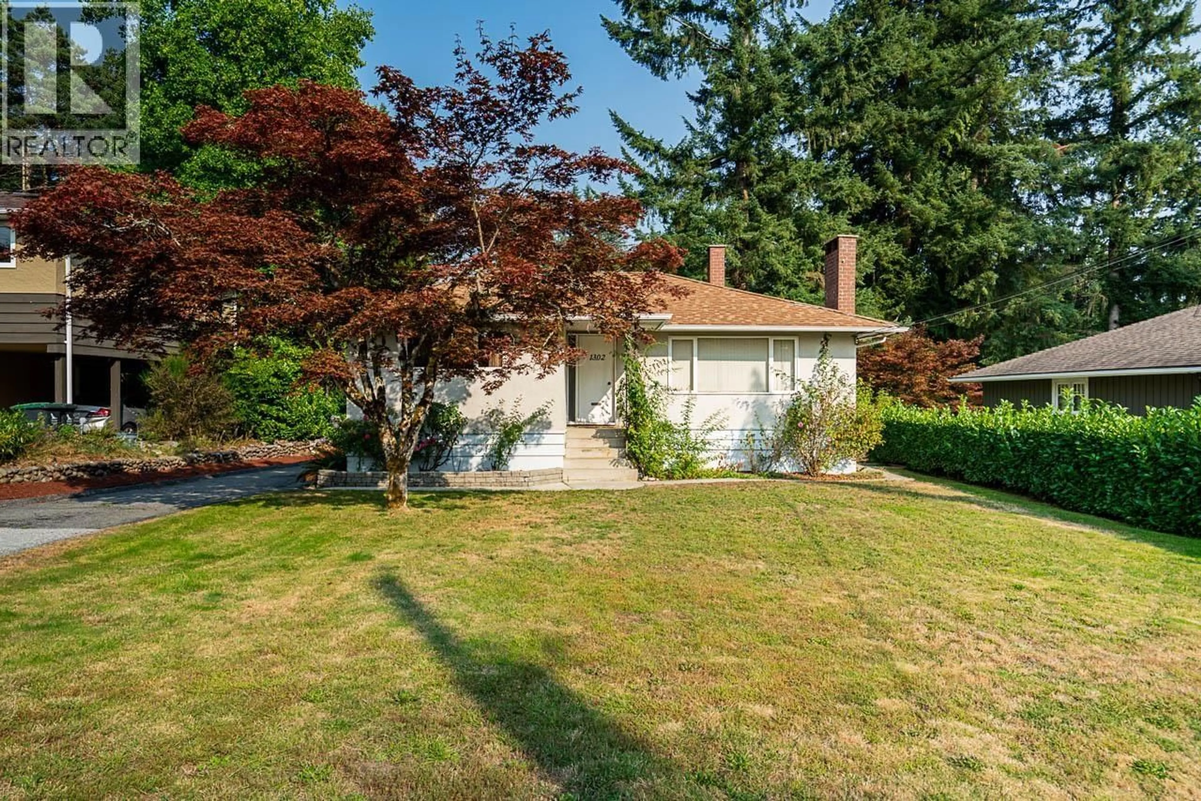 A pic from outside/outdoor area/front of a property/back of a property/a pic from drone, street for 1302 LENNOX STREET, North Vancouver British Columbia V7H1X3