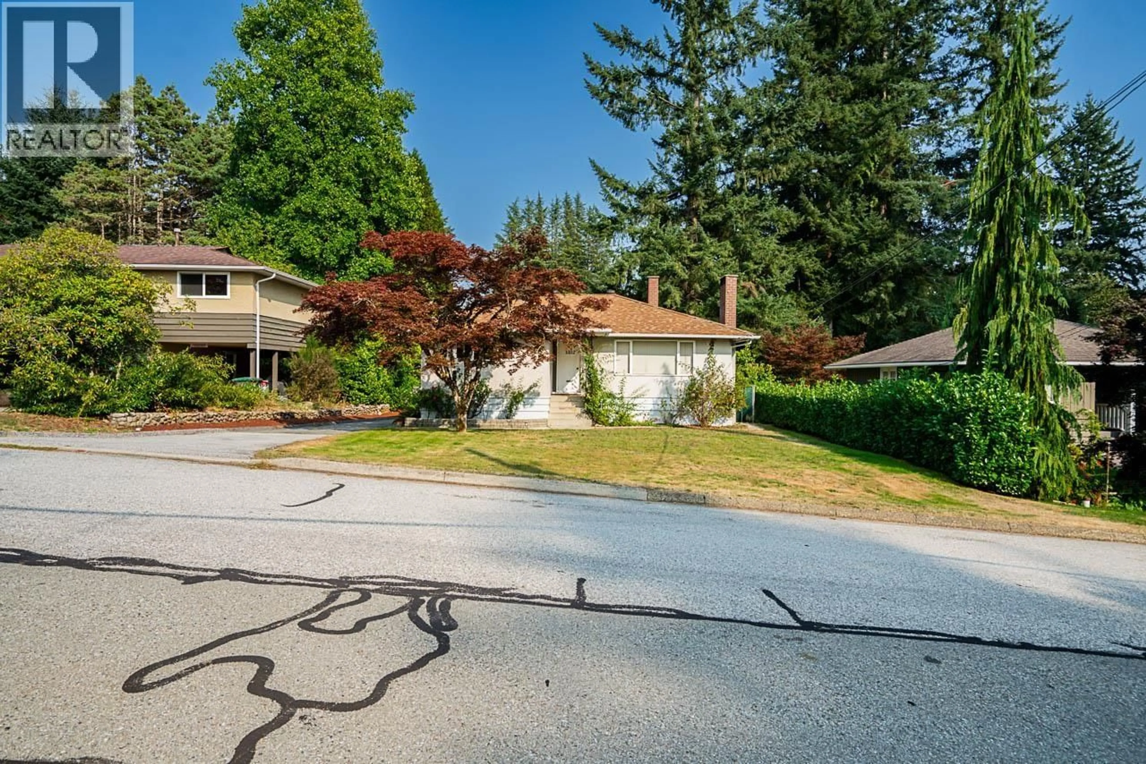 A pic from outside/outdoor area/front of a property/back of a property/a pic from drone, street for 1302 LENNOX STREET, North Vancouver British Columbia V7H1X3