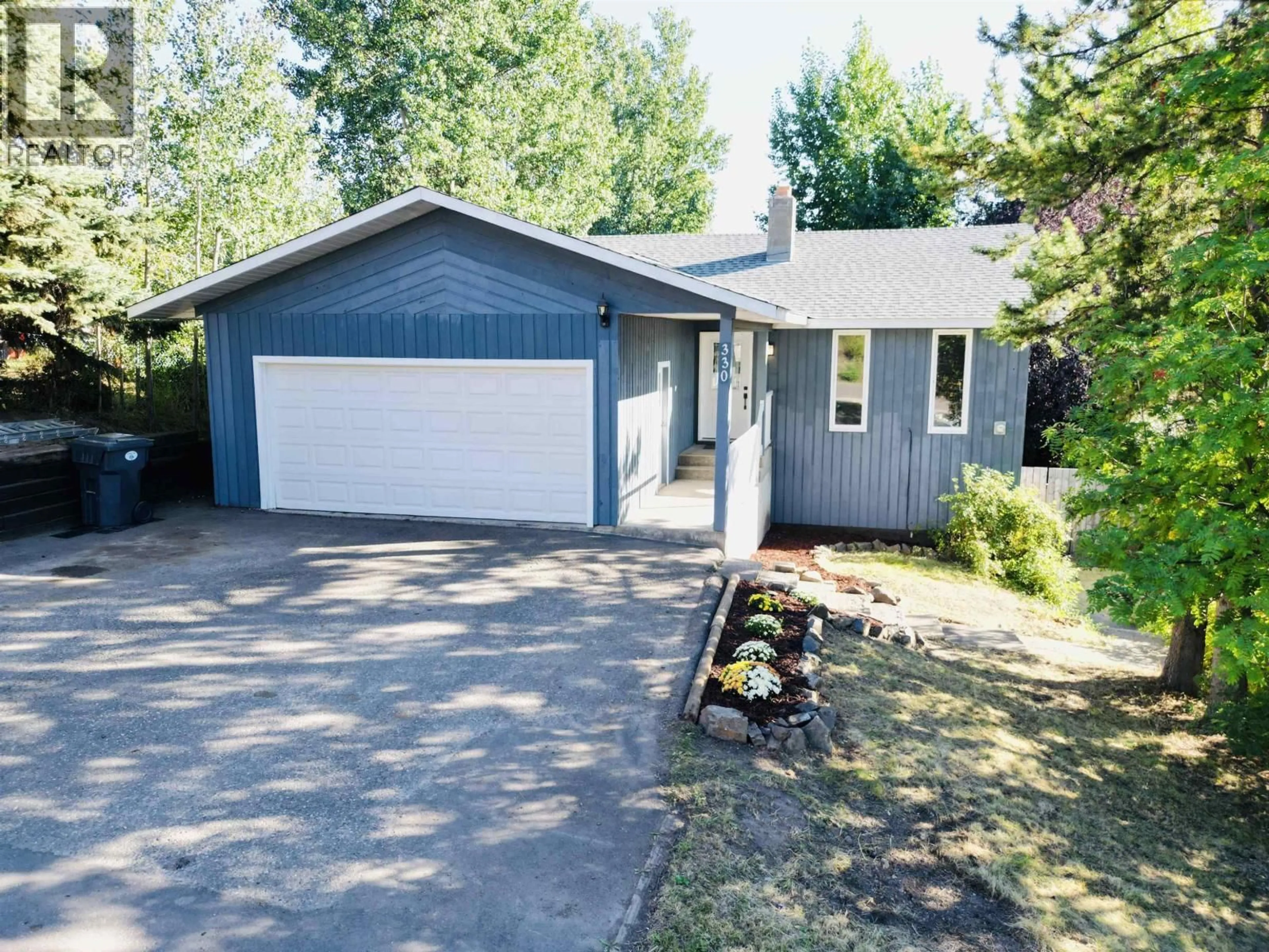 Home with vinyl exterior material, street for 330 9TH AVENUE, Burns Lake British Columbia V0J1E0