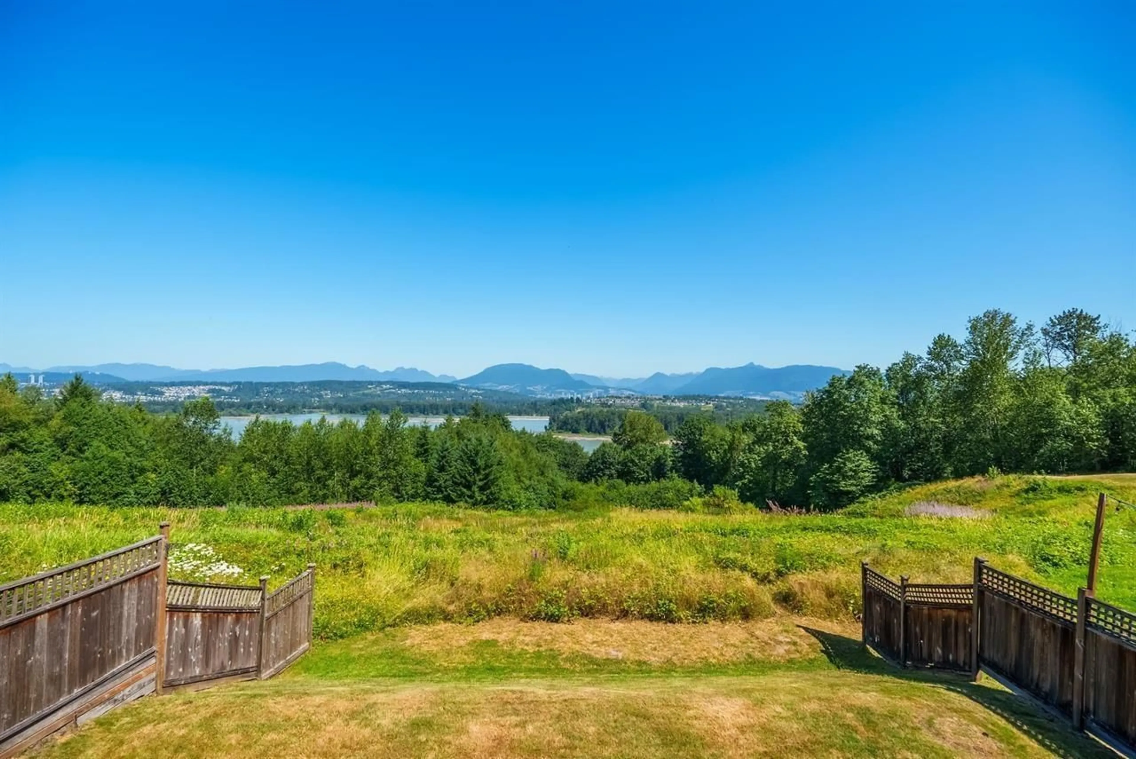 A pic from outside/outdoor area/front of a property/back of a property/a pic from drone, water/lake/river/ocean view for 11397 154A, Surrey British Columbia V3R2V7