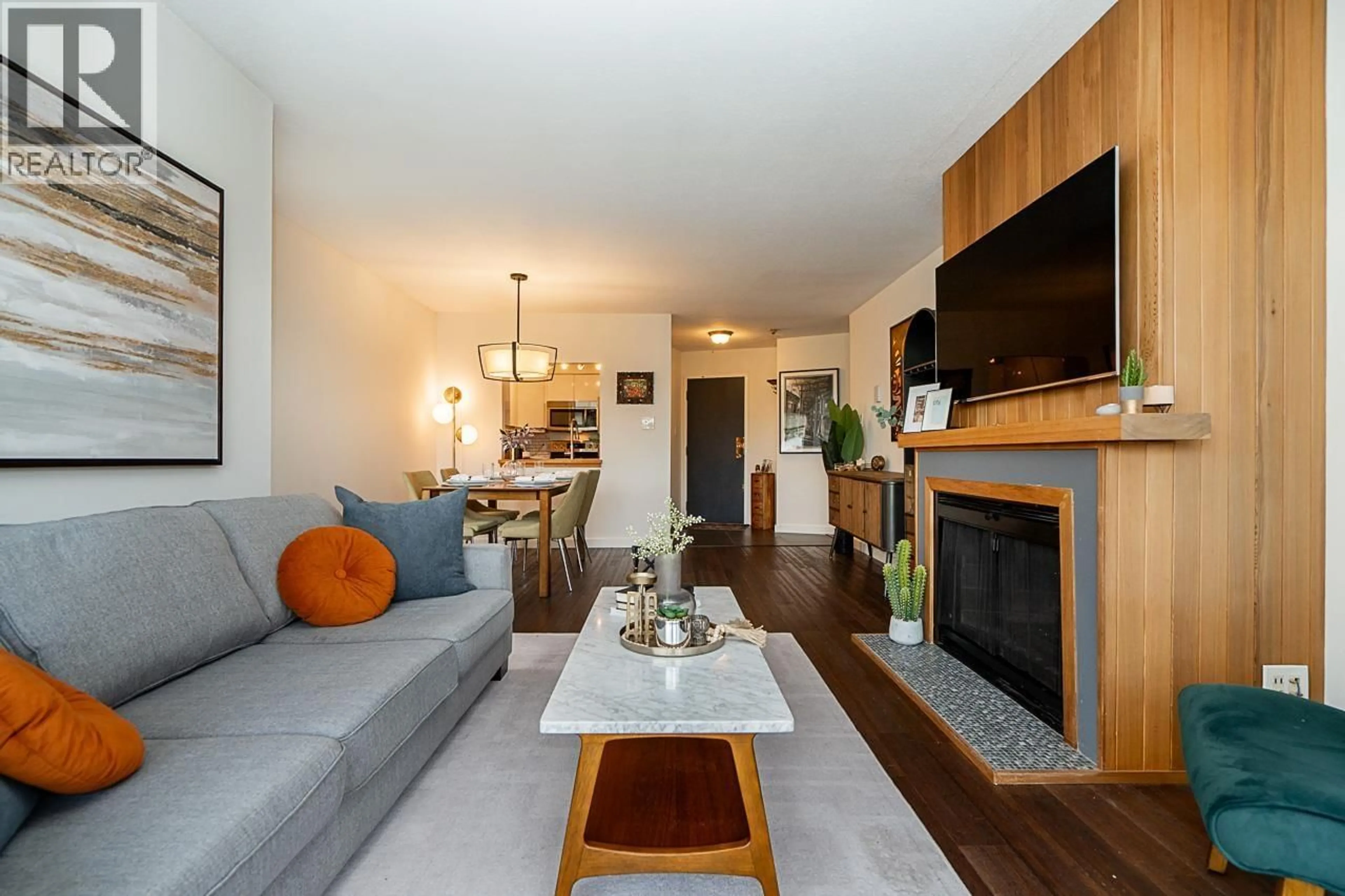 Living room with furniture, wood/laminate floor for 402 - 2222 PRINCE EDWARD STREET, Vancouver British Columbia V5T4M6