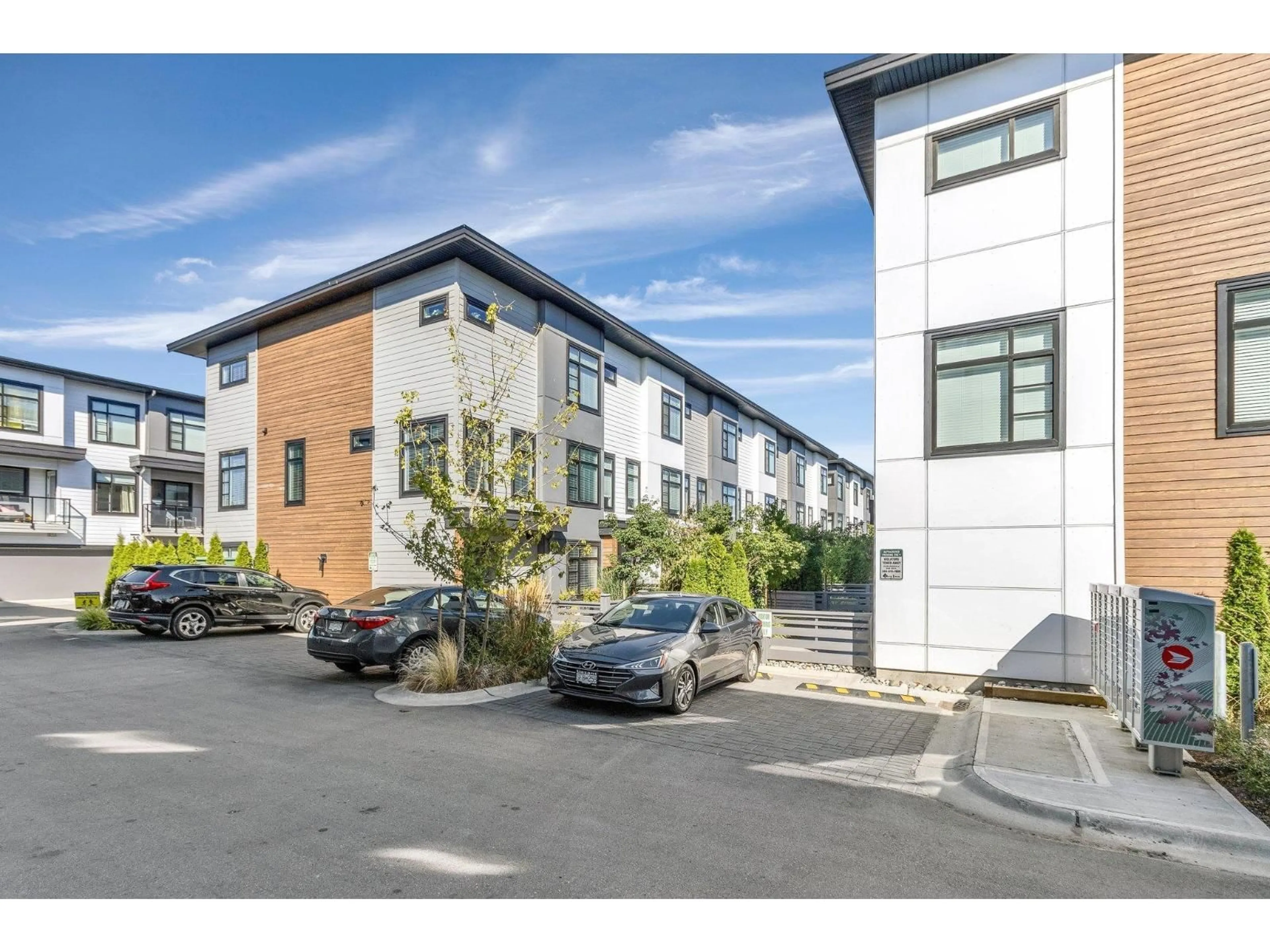 A pic from outside/outdoor area/front of a property/back of a property/a pic from drone, street for 21 - 7127 193A, Surrey British Columbia V4N6V9