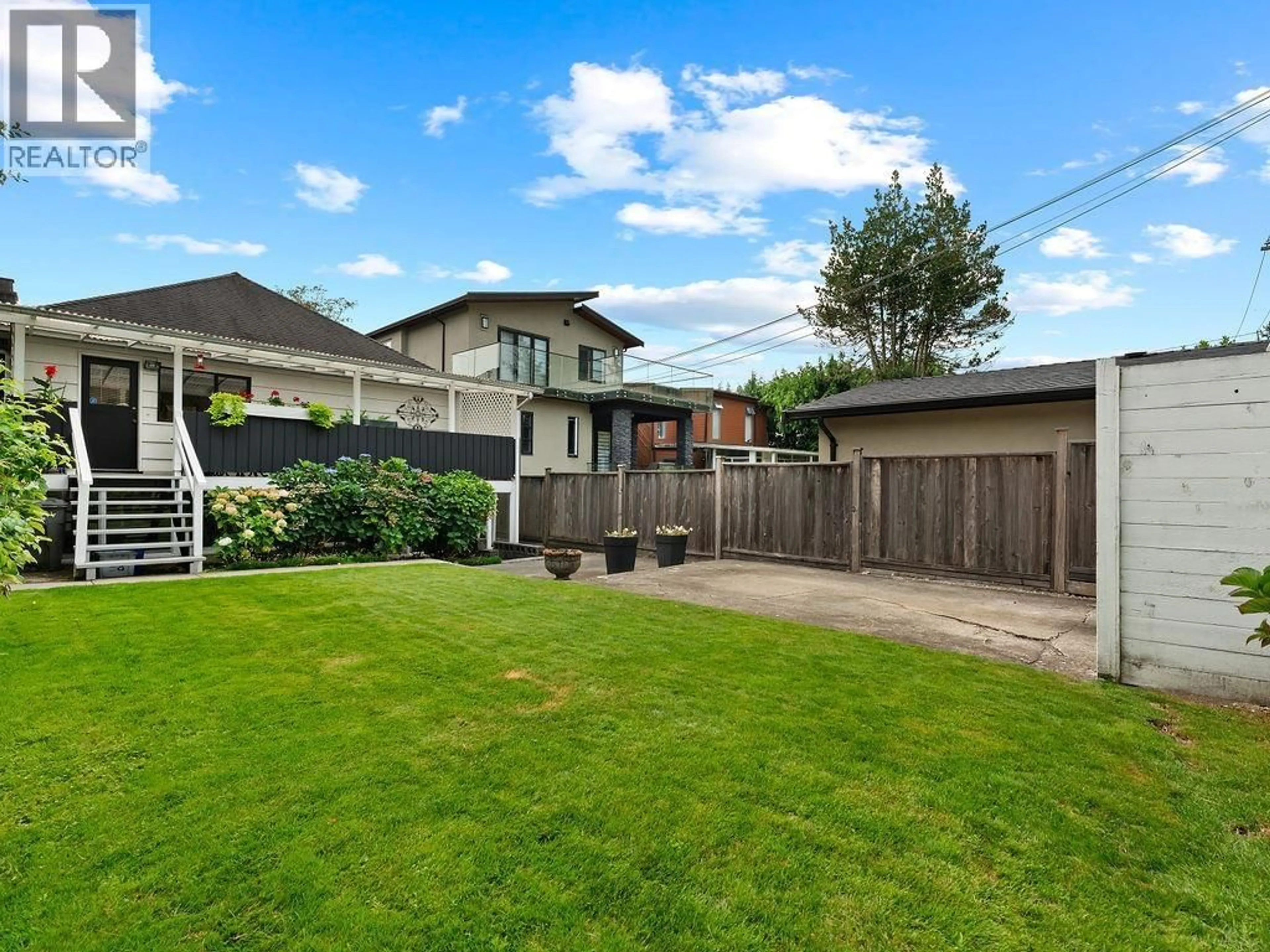 A pic from outside/outdoor area/front of a property/back of a property/a pic from drone, street for 2865 33RD AVENUE, Vancouver British Columbia V6N2G3