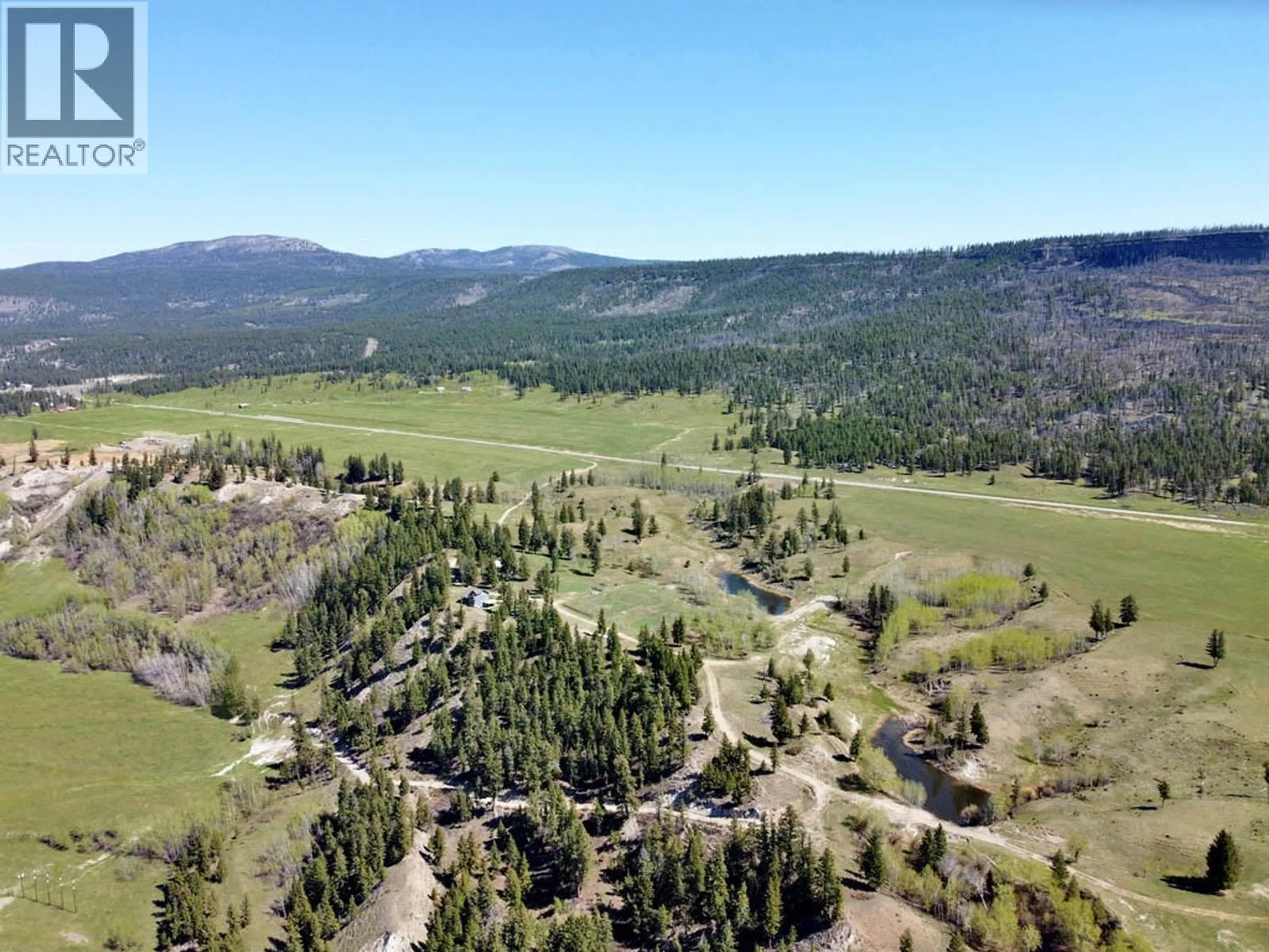 A pic from outside/outdoor area/front of a property/back of a property/a pic from drone, mountain view for 6547 CHILCOTIN 20 HIGHWAY, Chilcotin British Columbia V0L1K0