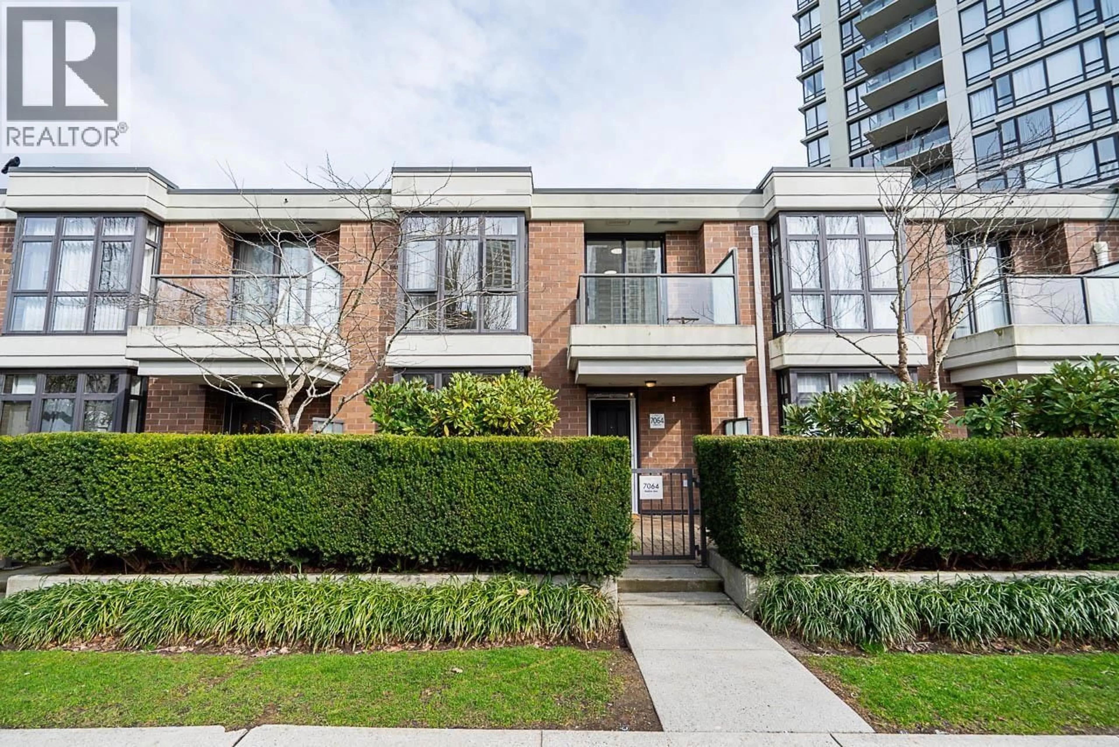 Home with brick exterior material, street for 7064 WALKER AVENUE, Burnaby British Columbia V5E3C5