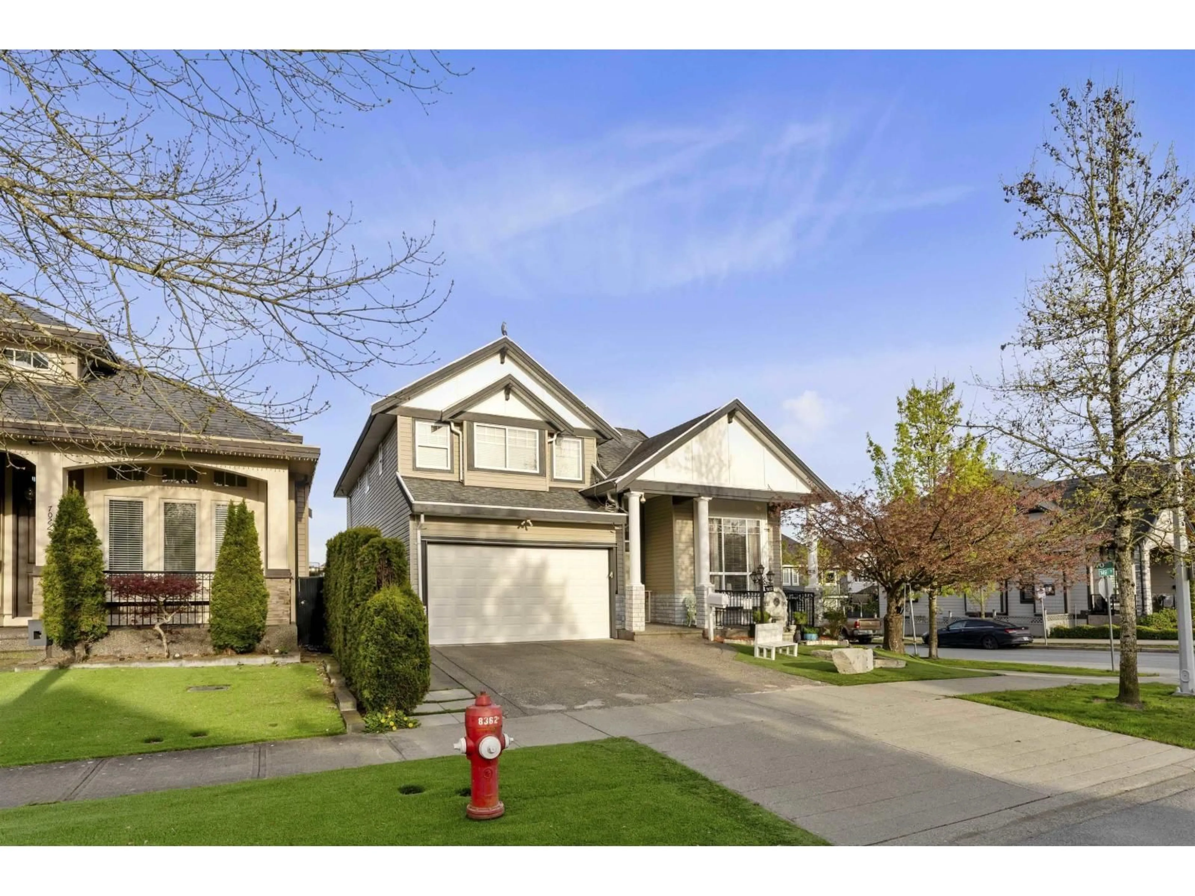 Home with vinyl exterior material, street for 7012 149TH, Surrey British Columbia V3S1K1