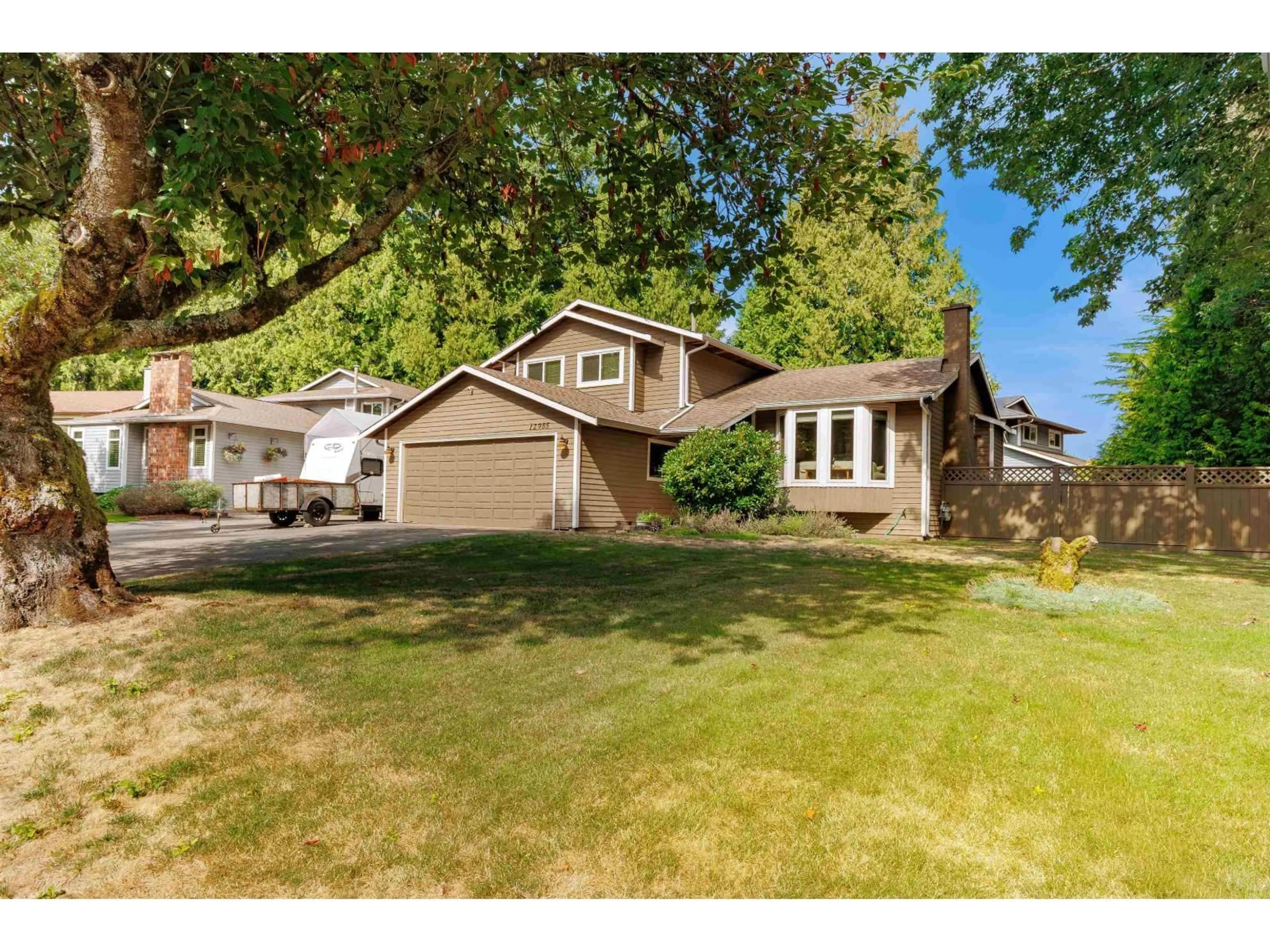 Home with vinyl exterior material, street for 12985 61B, Surrey British Columbia V3W8L2