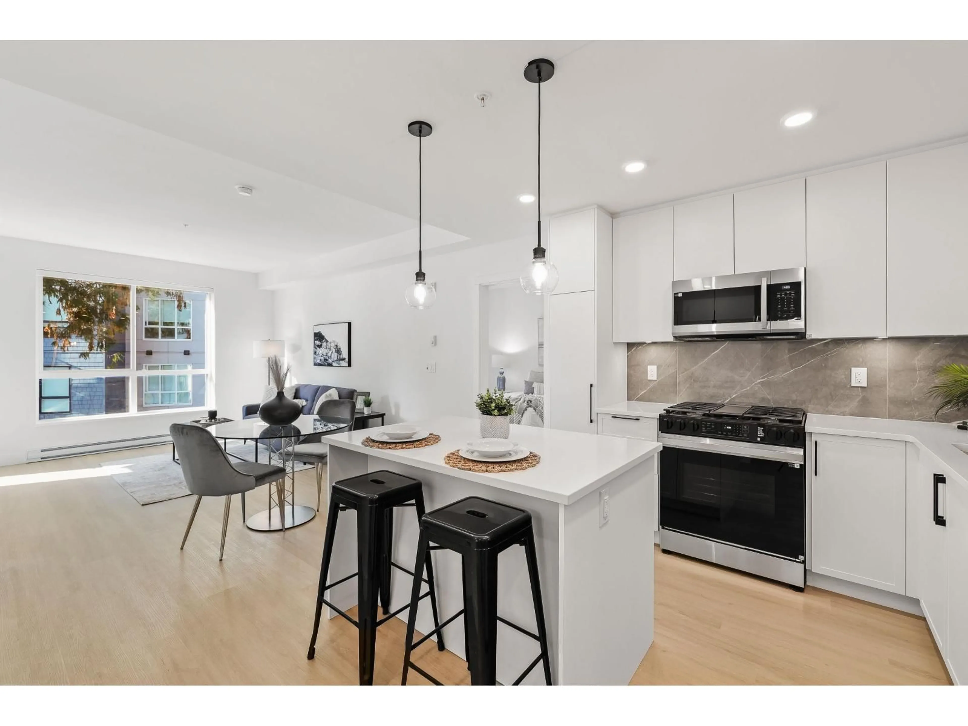 Open concept kitchen, unknown for 309 - 3438 146A, Surrey British Columbia V4P0J1
