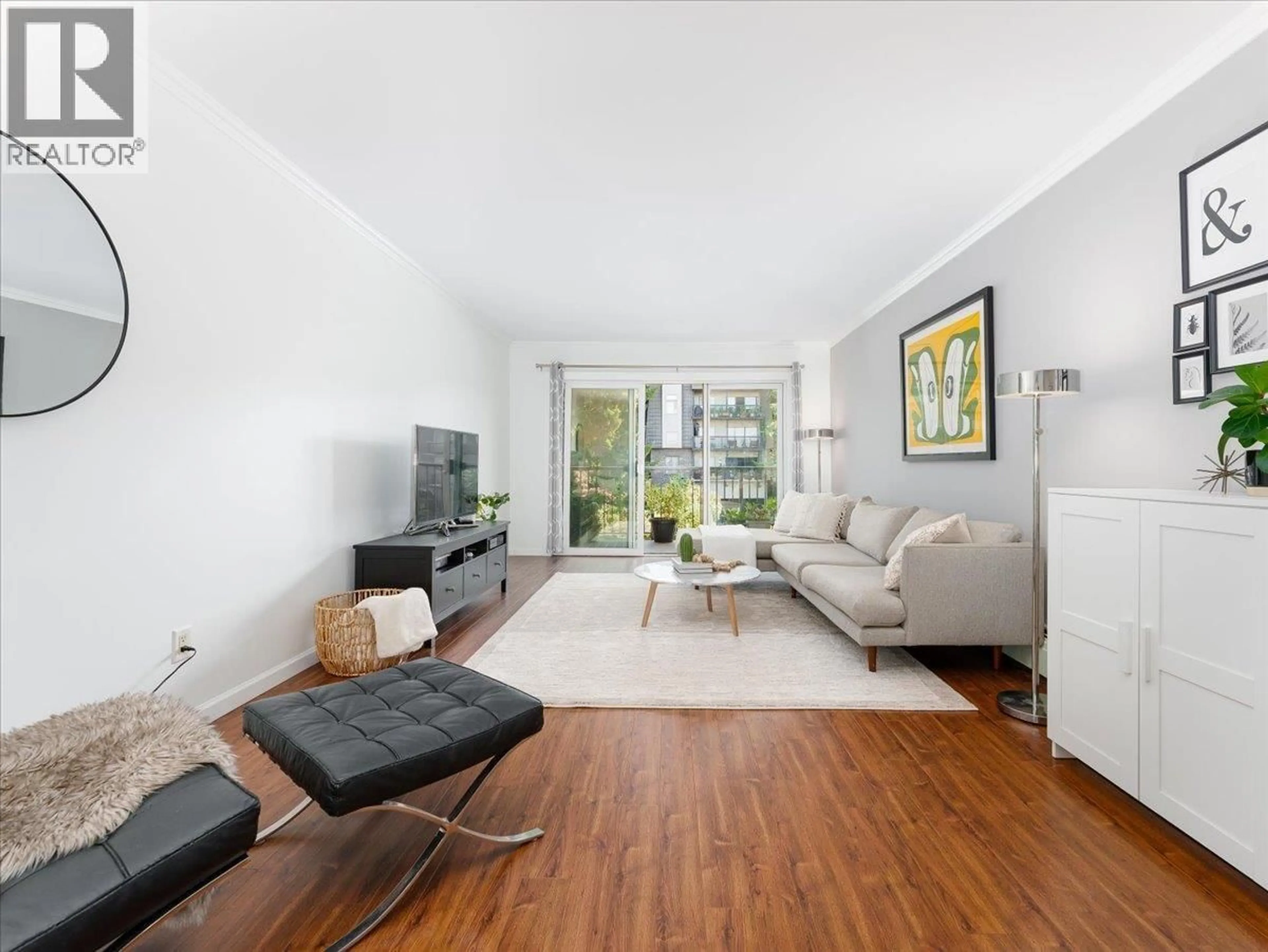 Living room with furniture, unknown for 301 - 155 5TH STREET, North Vancouver British Columbia V7L1L3