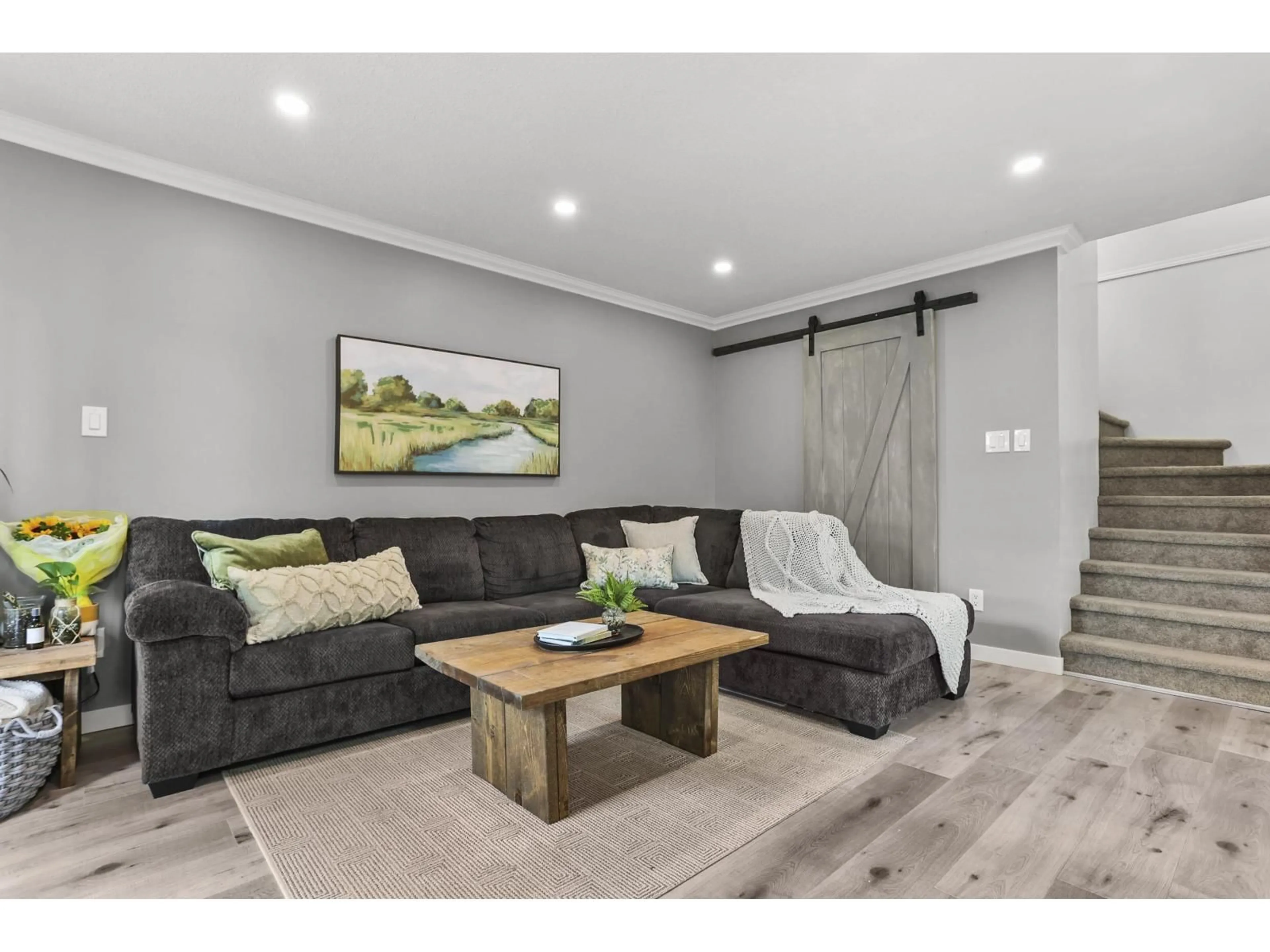 Living room with furniture, wood/laminate floor for 120 - 27456 32, Langley British Columbia V4W3P2