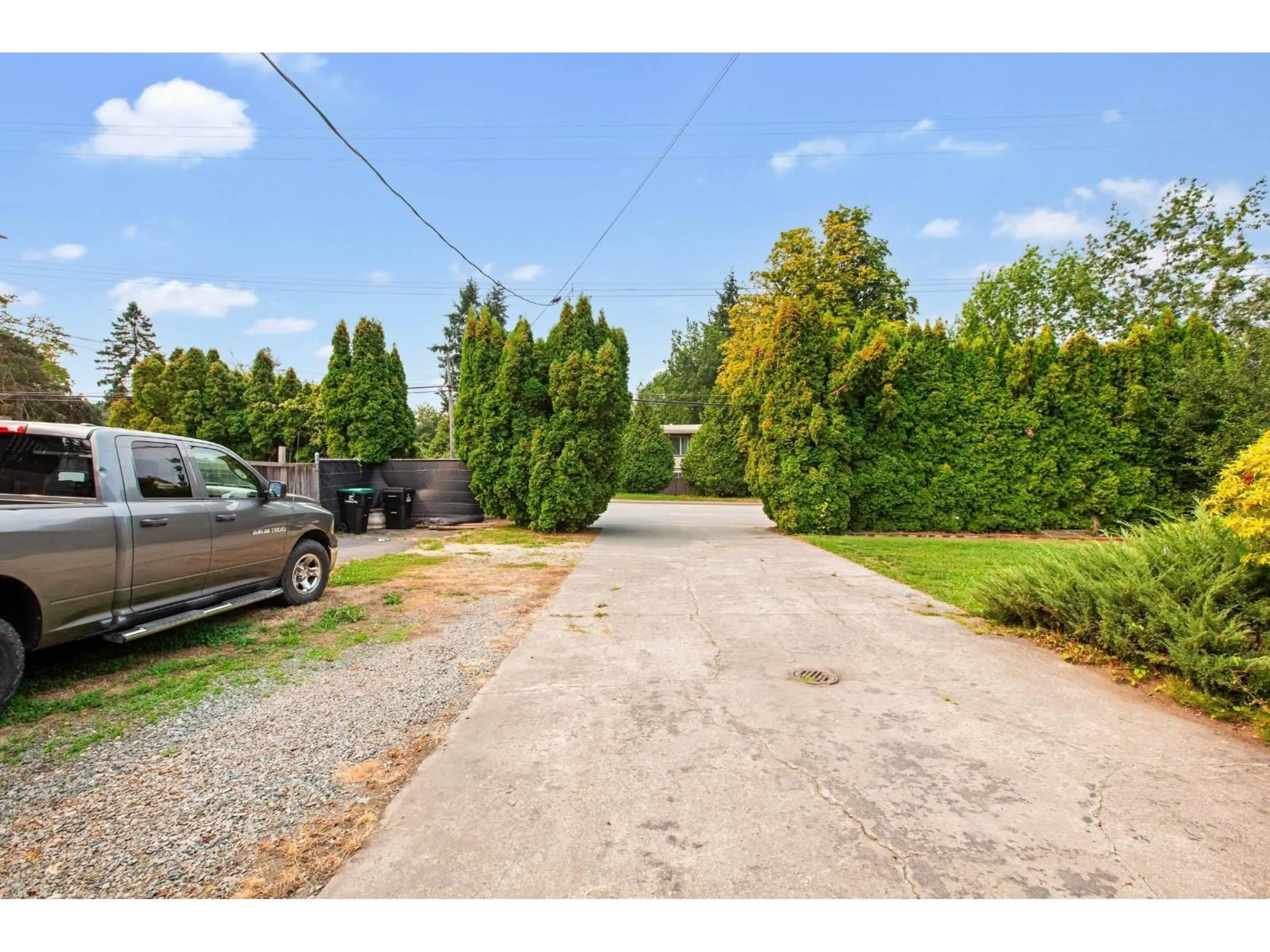 A pic from outside/outdoor area/front of a property/back of a property/a pic from drone, street for 4880 200, Langley British Columbia V3A1L5