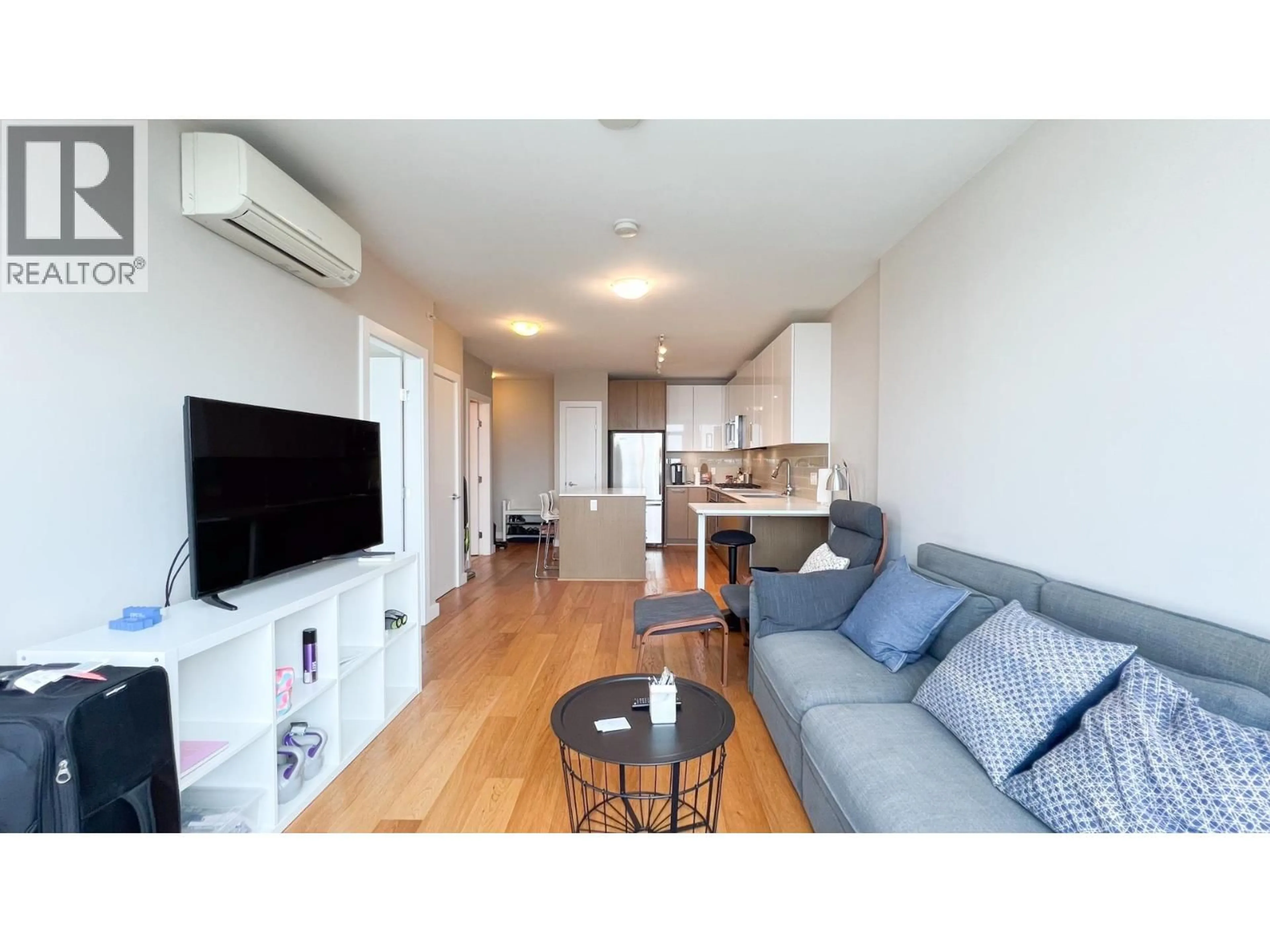 Living room with furniture, wood/laminate floor for 901 - 6200 RIVER ROAD, Richmond British Columbia V7C4N1