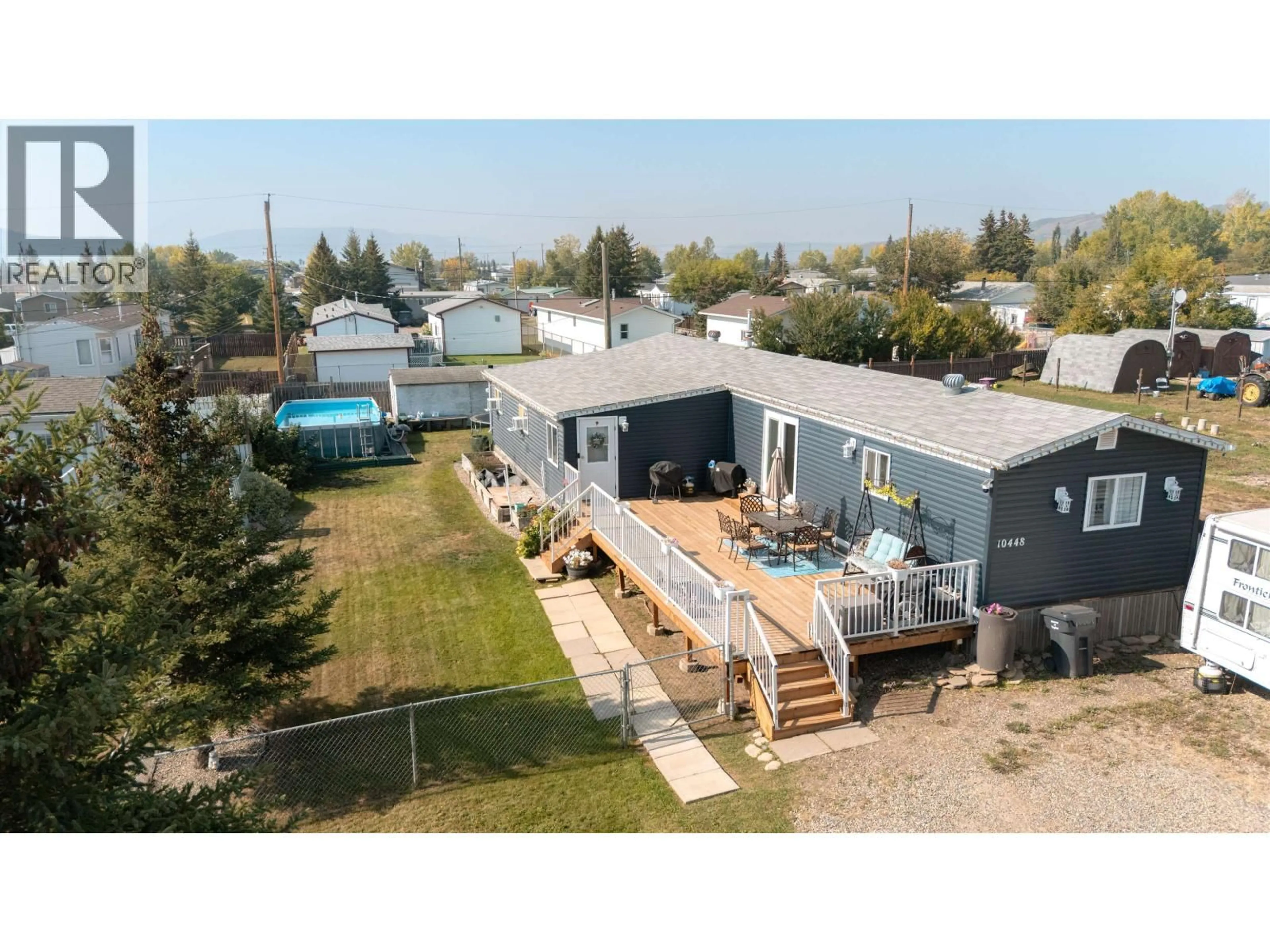 A pic from outside/outdoor area/front of a property/back of a property/a pic from drone, street for 10448 98 STREET, Taylor British Columbia V0C2K0