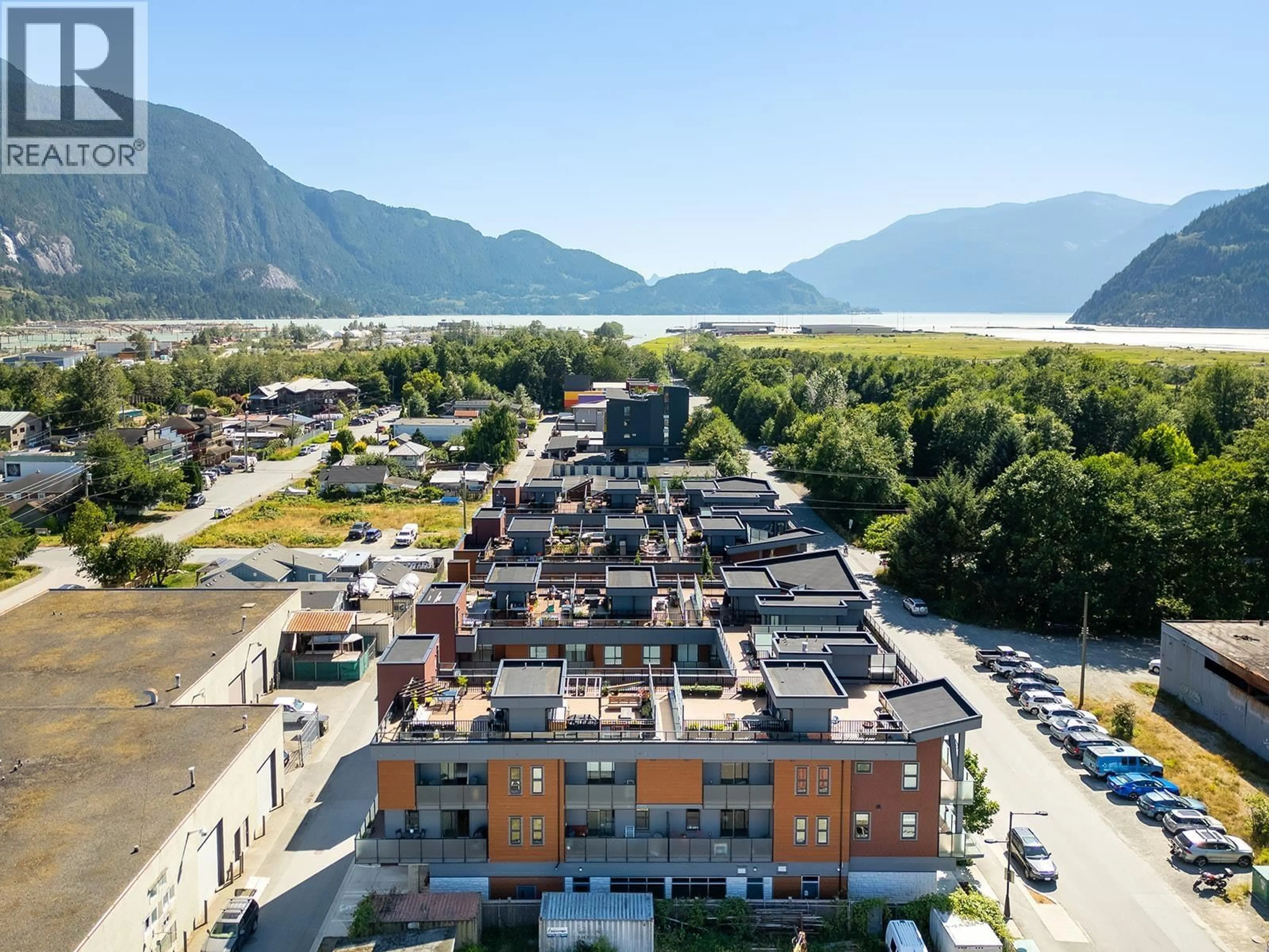 A pic from outside/outdoor area/front of a property/back of a property/a pic from drone, mountain view for 213 - 37842 THIRD AVENUE, Squamish British Columbia V8B1B9