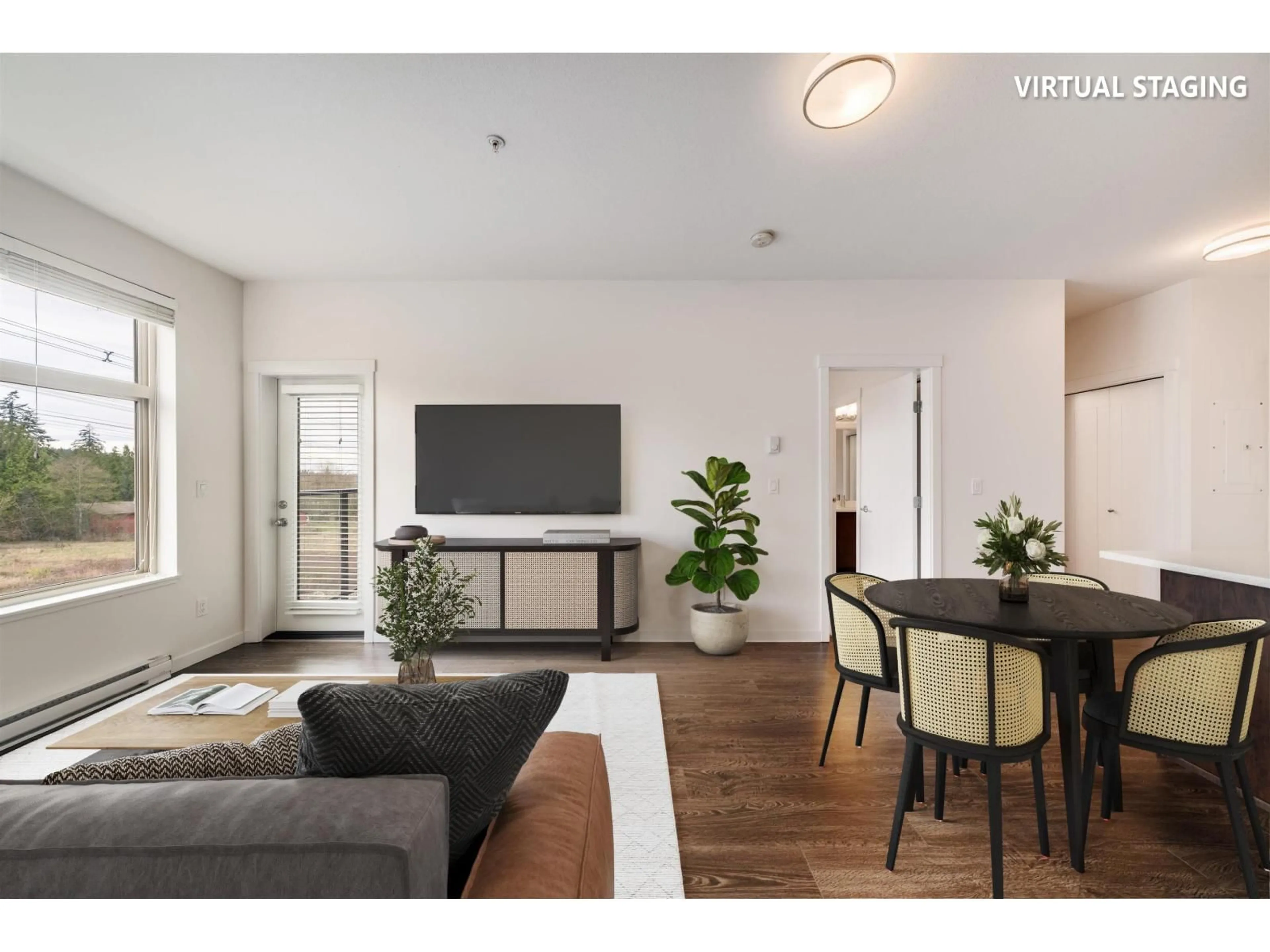 Living room with furniture, wood/laminate floor for 407 - 2855 156, Surrey British Columbia V3Z3Y3