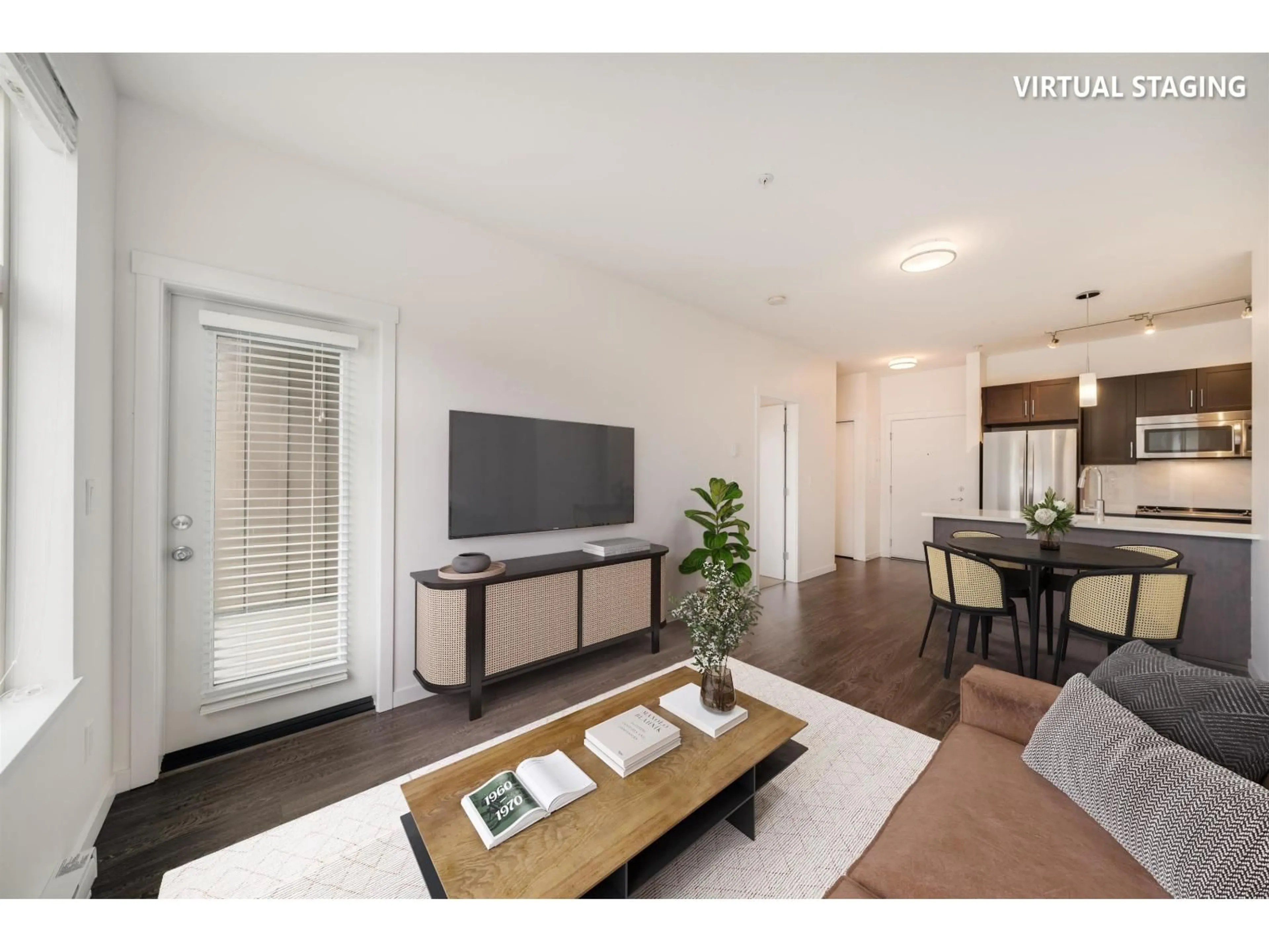 Living room with furniture, wood/laminate floor for 407 - 2855 156, Surrey British Columbia V3Z3Y3