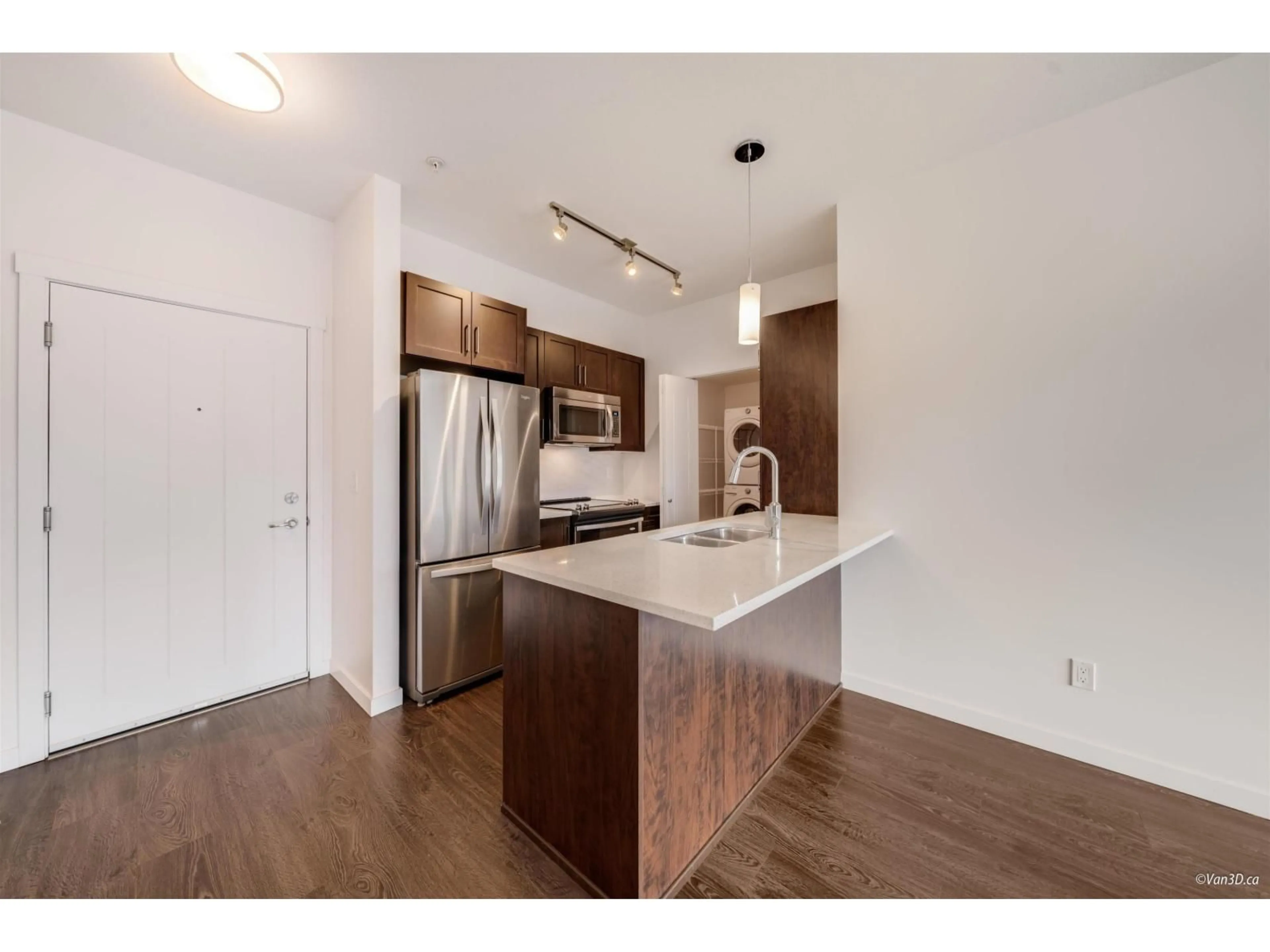 Open concept kitchen, wood/laminate floor for 407 - 2855 156, Surrey British Columbia V3Z3Y3
