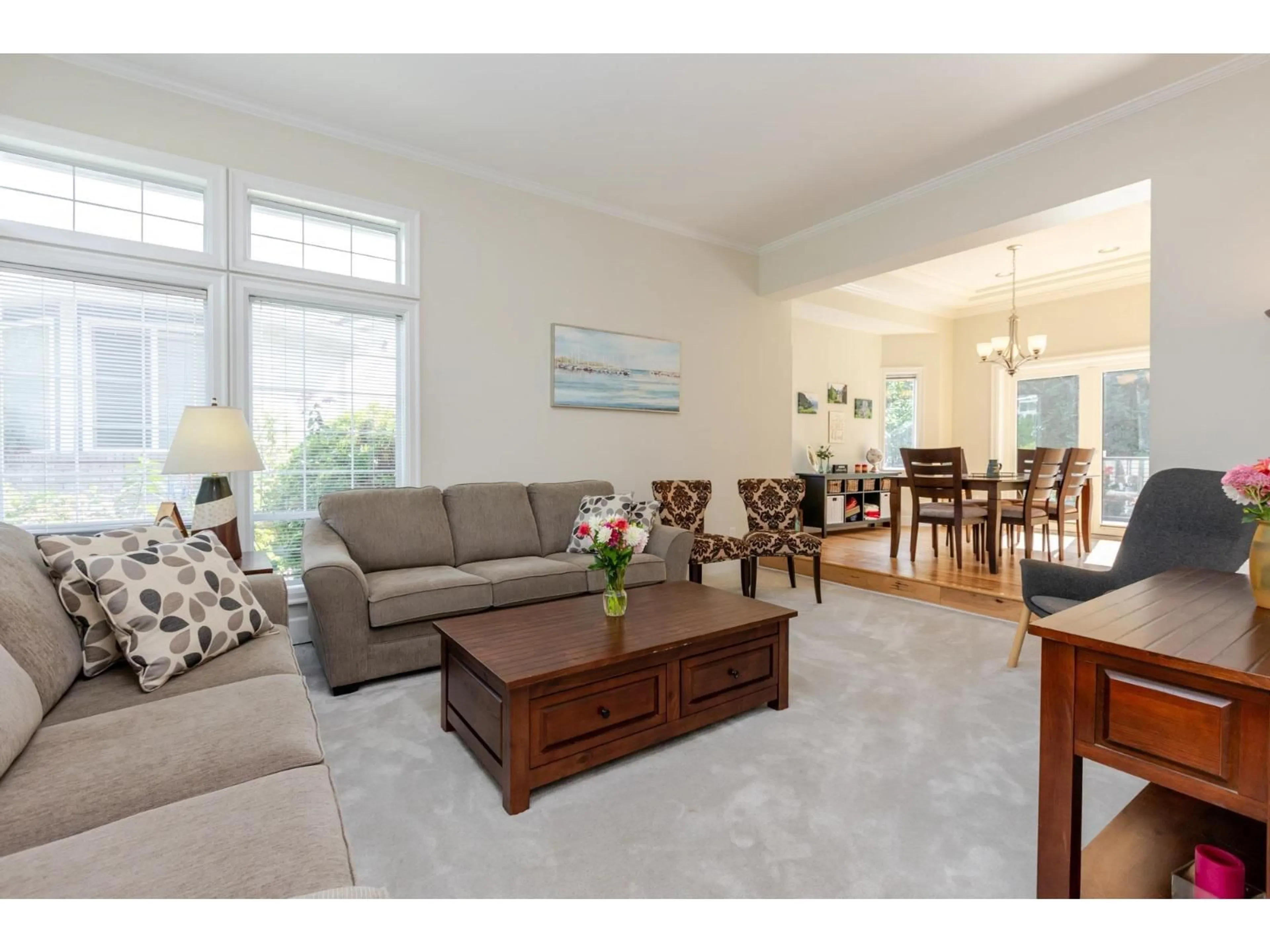 Living room with furniture, wood/laminate floor for 30876 SANDPIPER, Abbotsford British Columbia V2T5L6