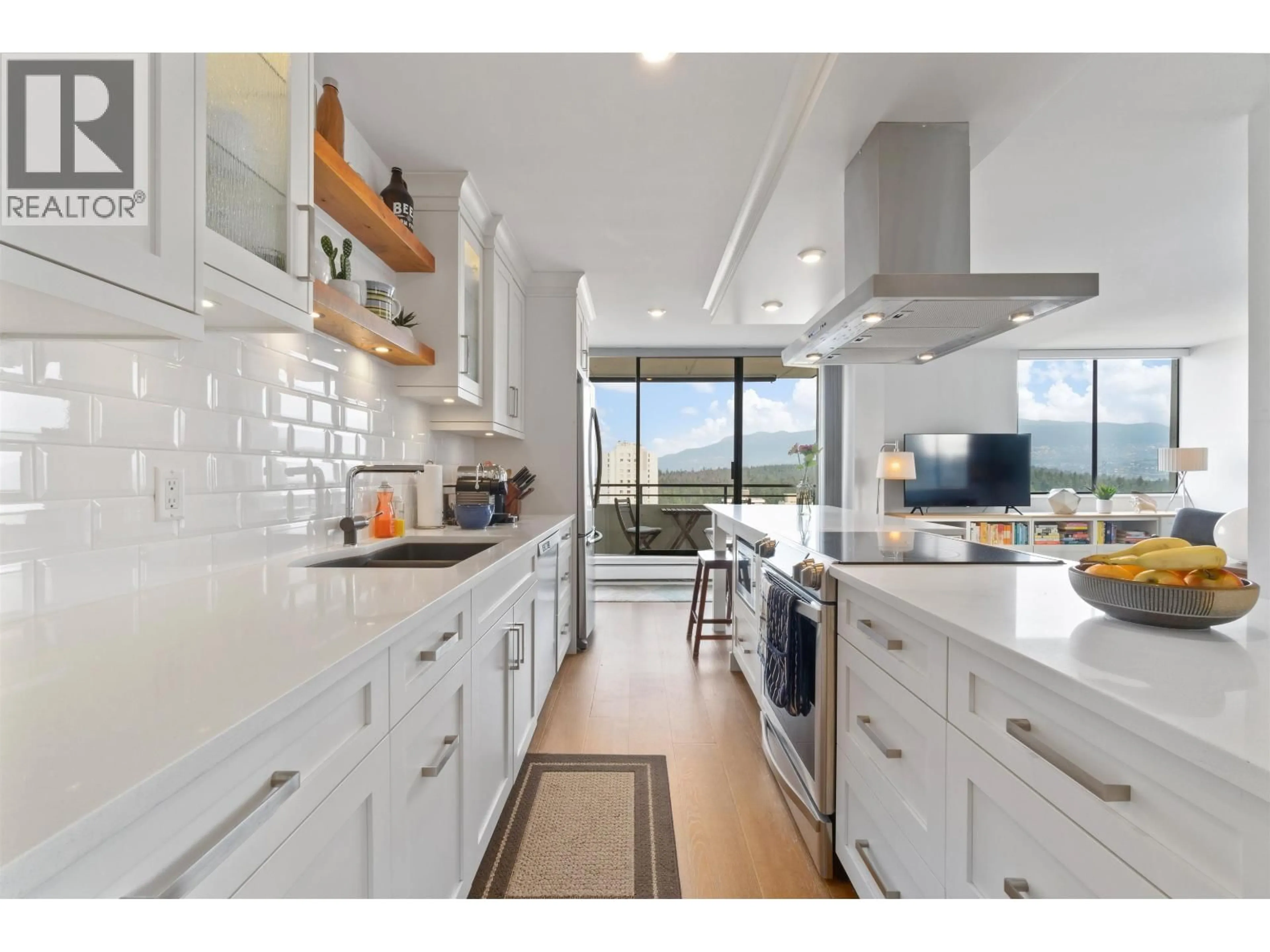 Open concept kitchen, ceramic/tile floor for 2204 - 1816 HARO STREET, Vancouver British Columbia V6G2Y7