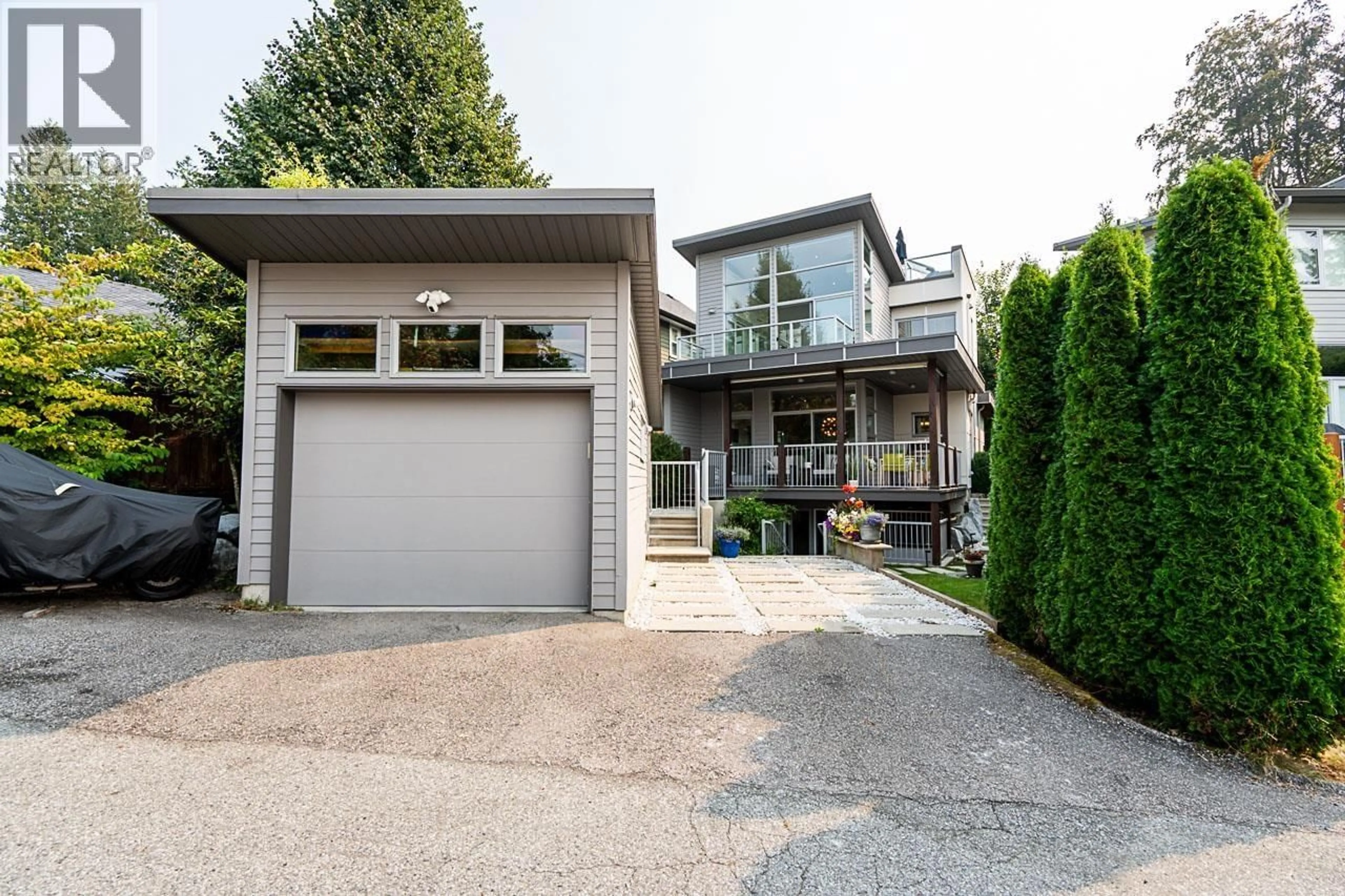 Home with vinyl exterior material, street for 2007 LARSON ROAD, North Vancouver British Columbia V7M3A1