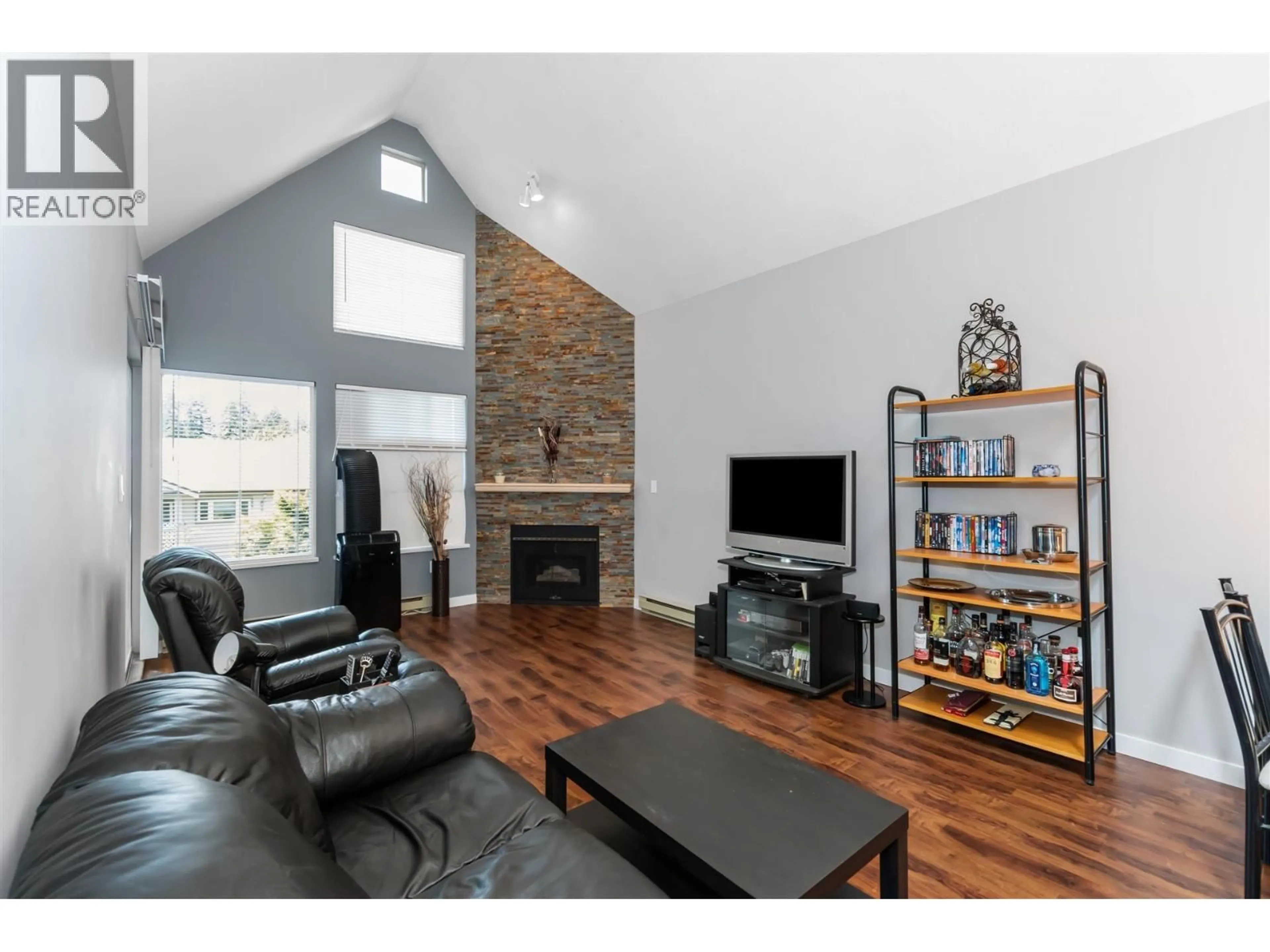 Living room with furniture, wood/laminate floor for 307 - 7465 SANDBORNE AVENUE, Burnaby British Columbia V3N4W7