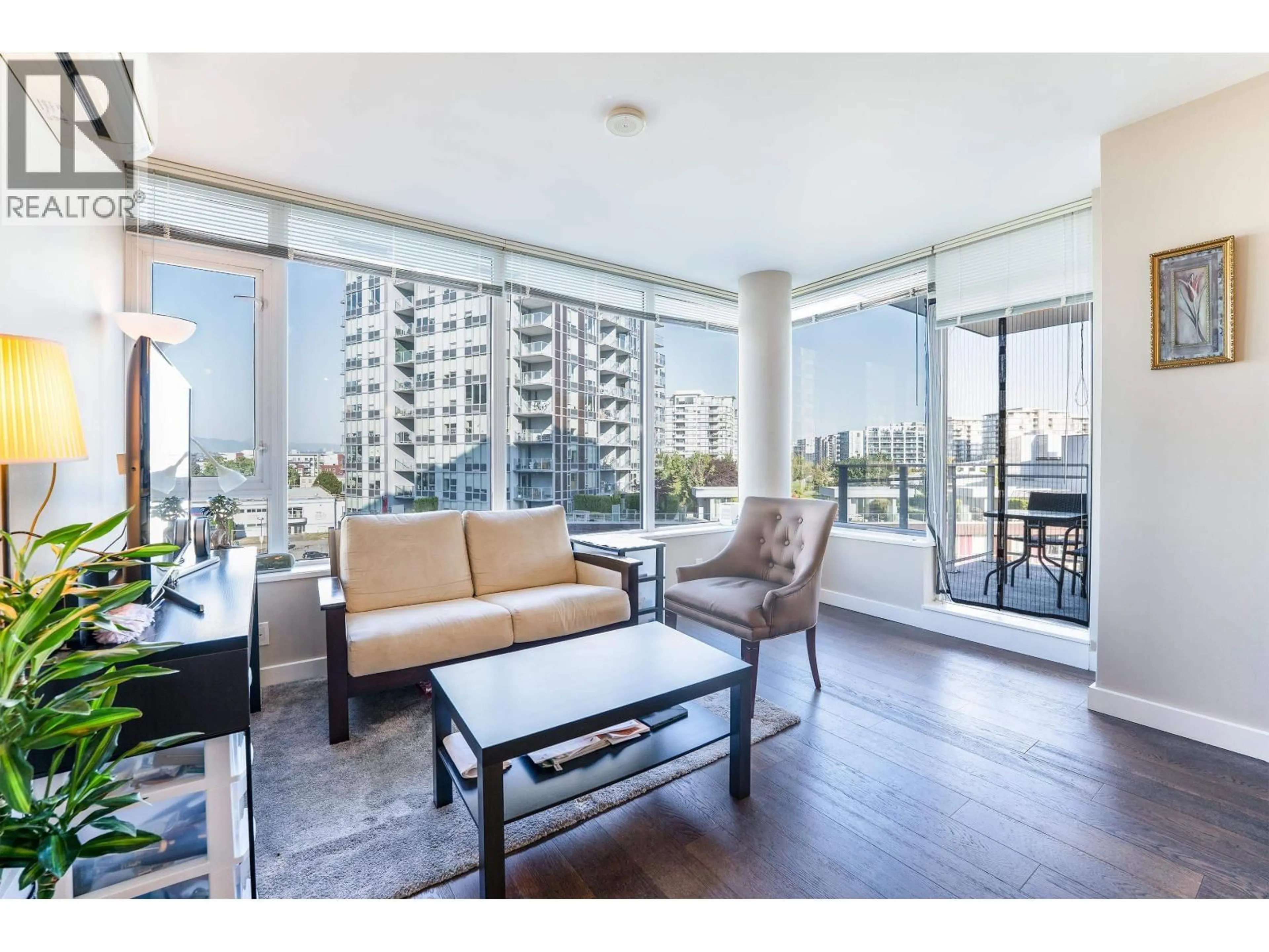 Living room with furniture, wood/laminate floor for 708 - 6971 ELMBRIDGE WAY, Richmond British Columbia V7C0A5