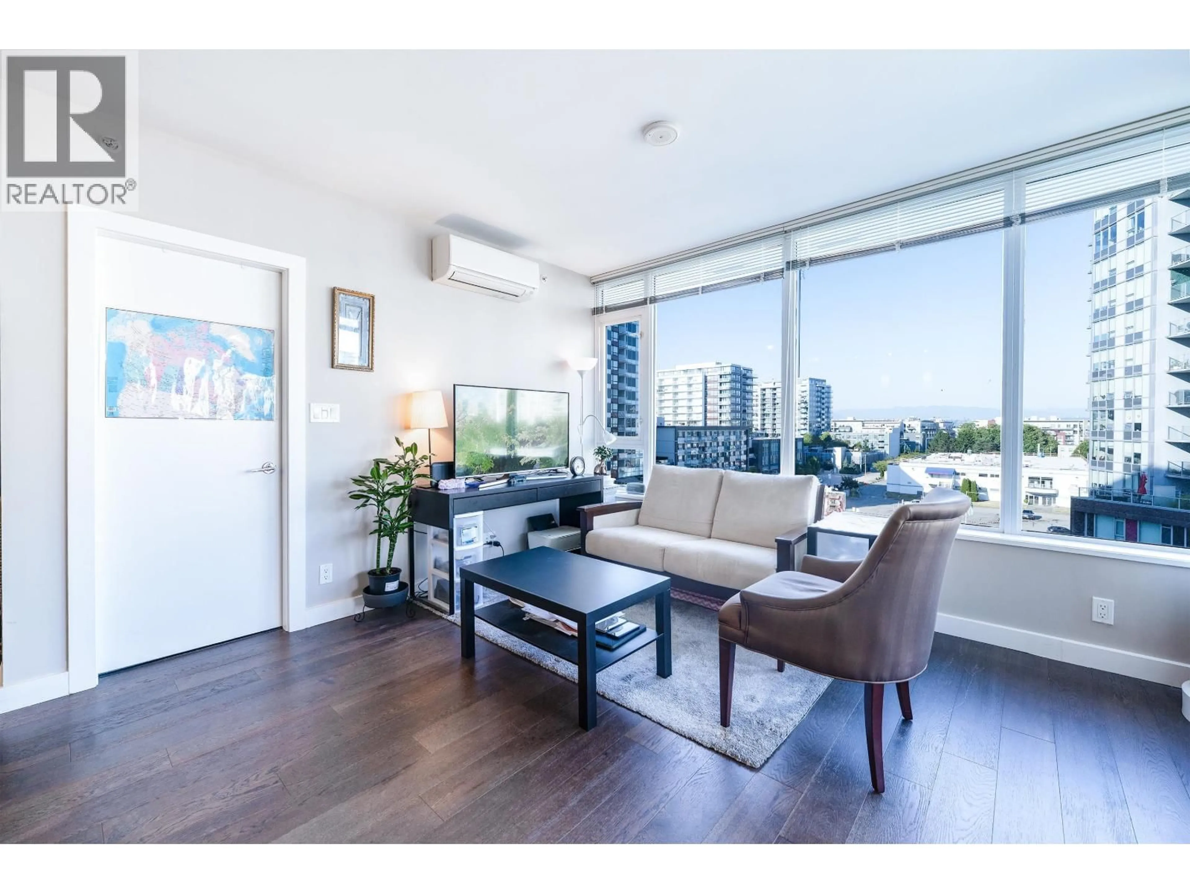 Living room with furniture, wood/laminate floor for 708 - 6971 ELMBRIDGE WAY, Richmond British Columbia V7C0A5