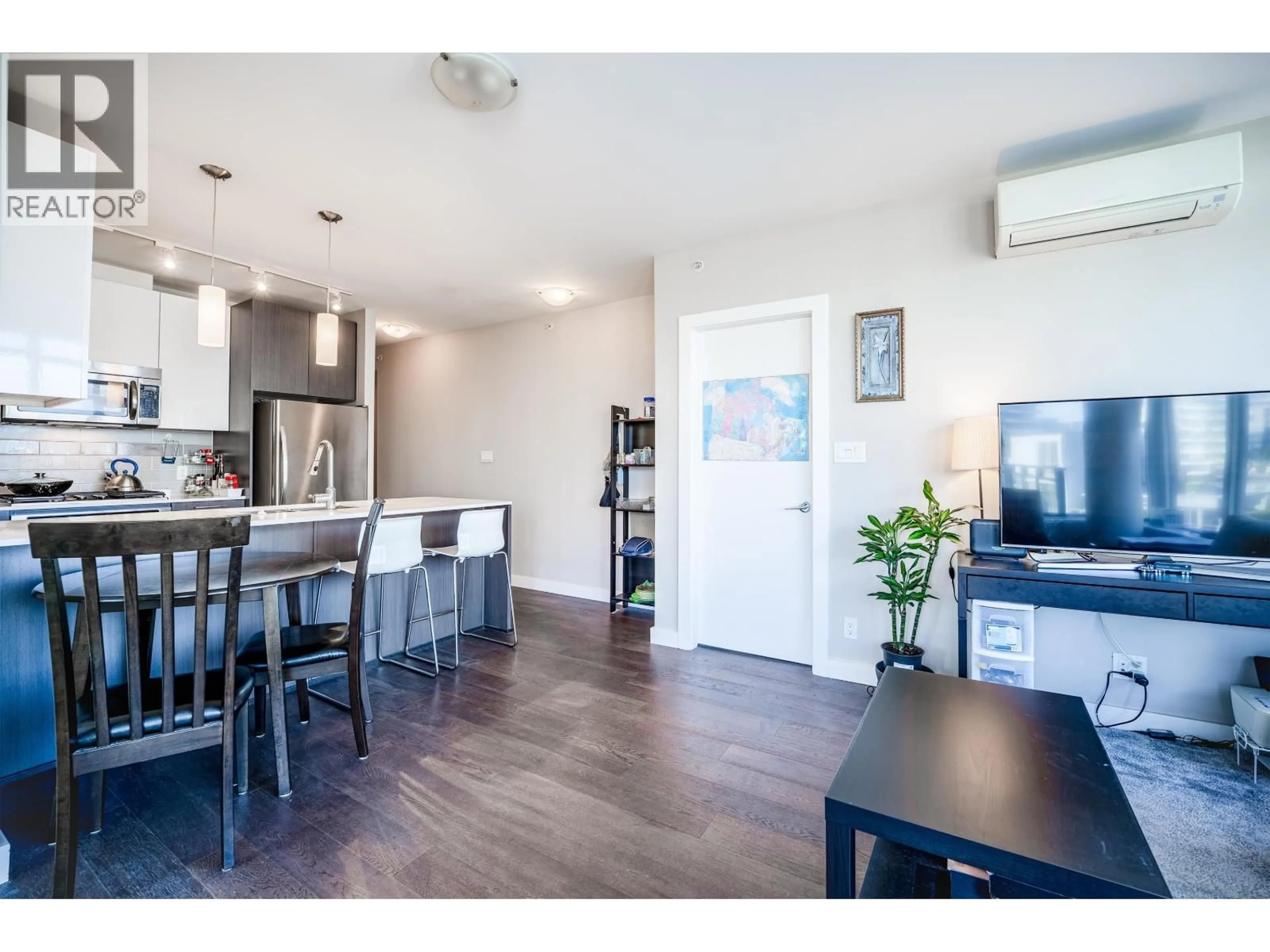 Open concept kitchen, wood/laminate floor for 708 - 6971 ELMBRIDGE WAY, Richmond British Columbia V7C0A5