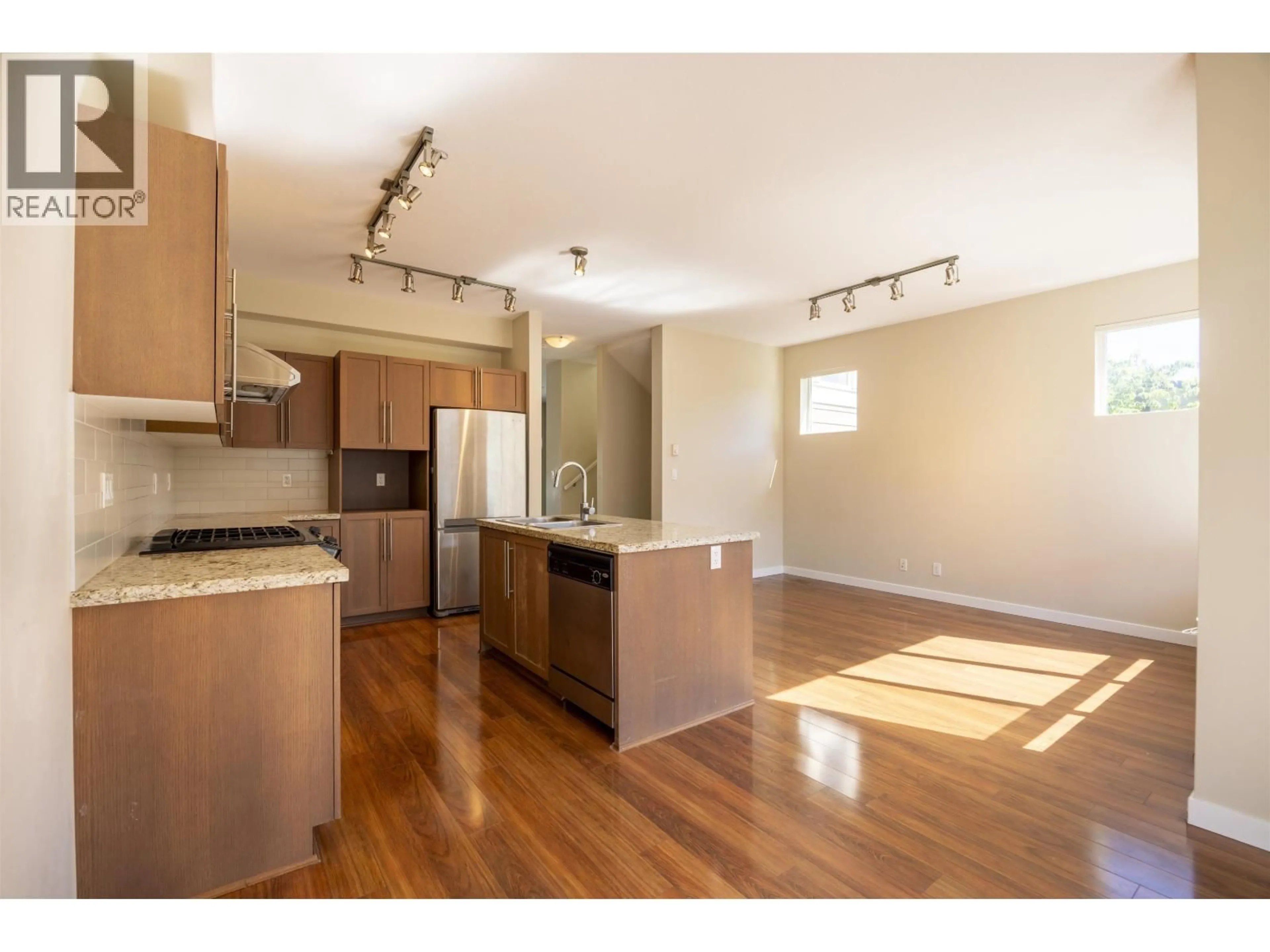 Open concept kitchen, wood/laminate floor for 112 - 1125 KENSAL PLACE, Coquitlam British Columbia V3B0G3