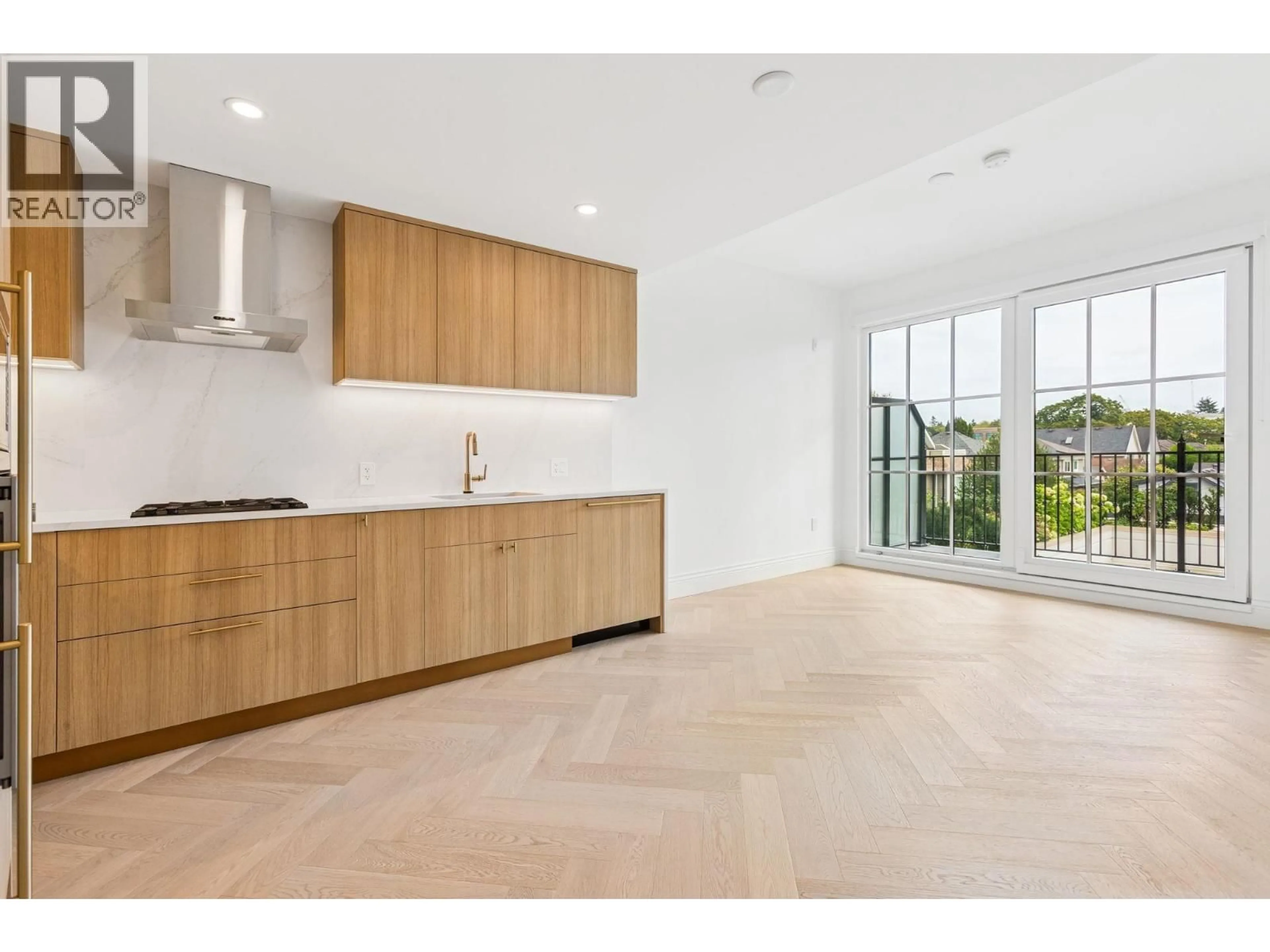 Open concept kitchen, unknown for 304 - 2096 47TH AVENUE, Vancouver British Columbia V6M0E5
