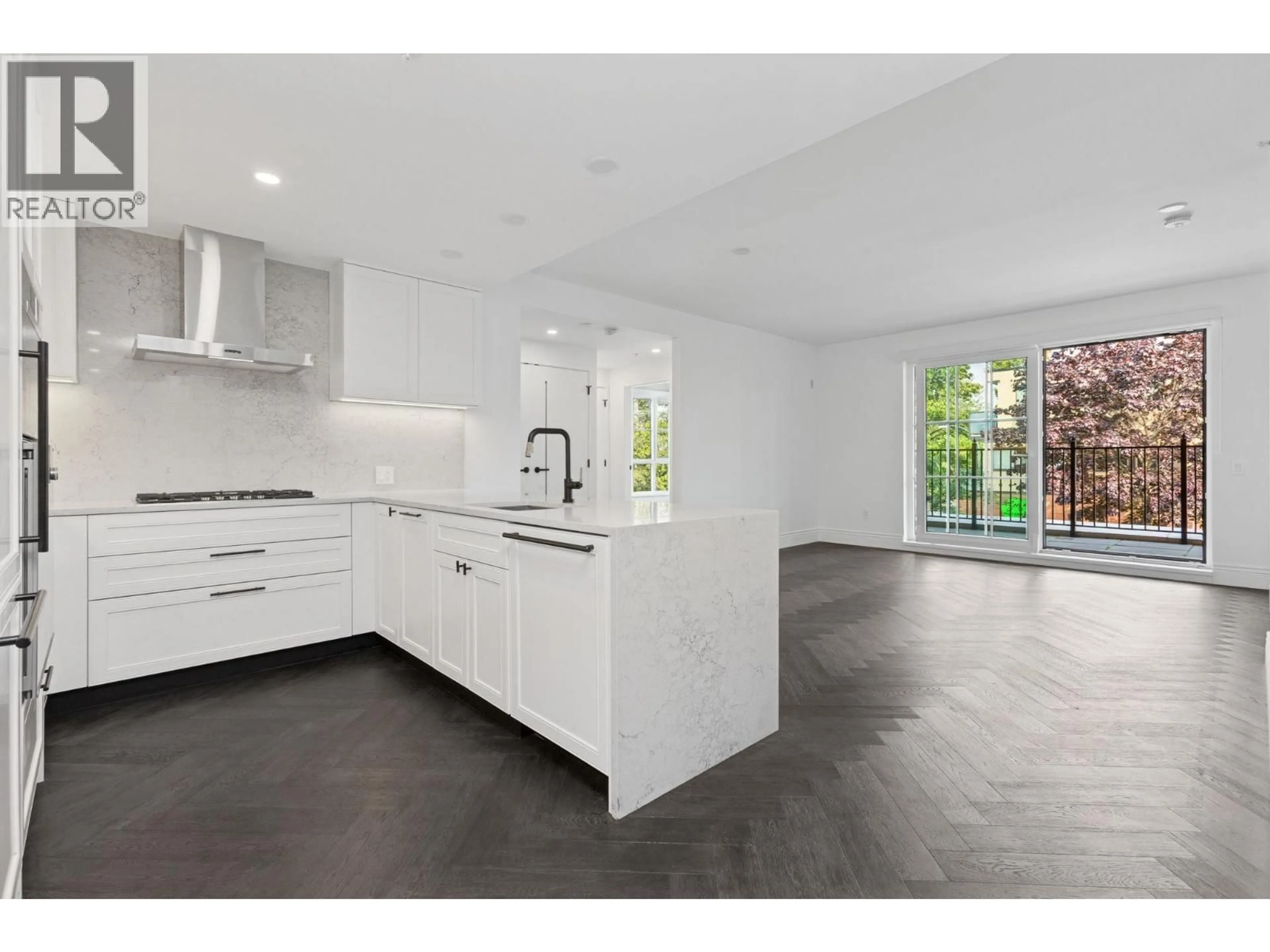 Open concept kitchen, ceramic/tile floor for 213 - 2096 47TH AVENUE, Vancouver British Columbia V6M0E5