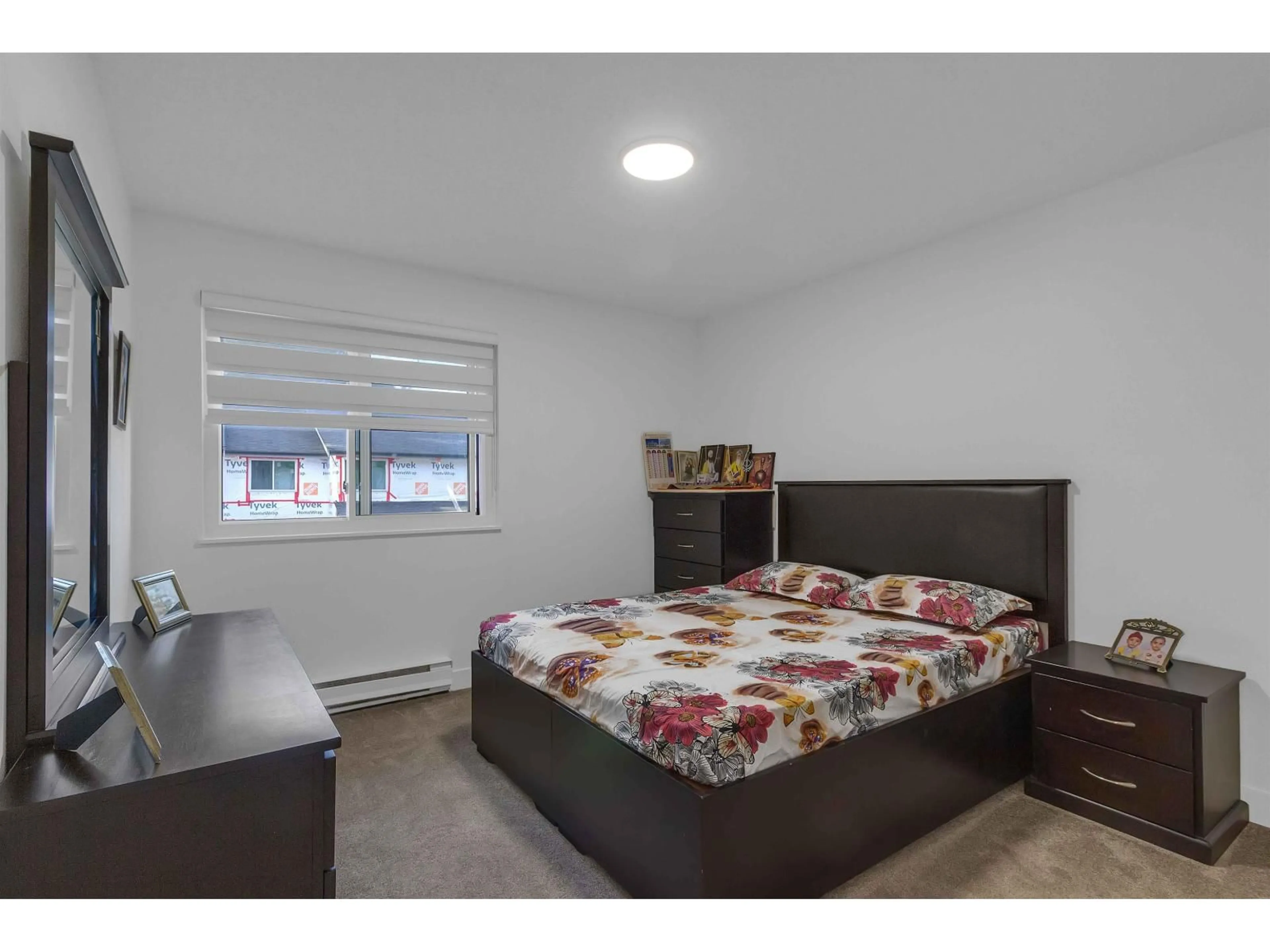 Bedroom with bed, wood/laminate floor for 138 - 7321 140, Surrey British Columbia V3W5J6