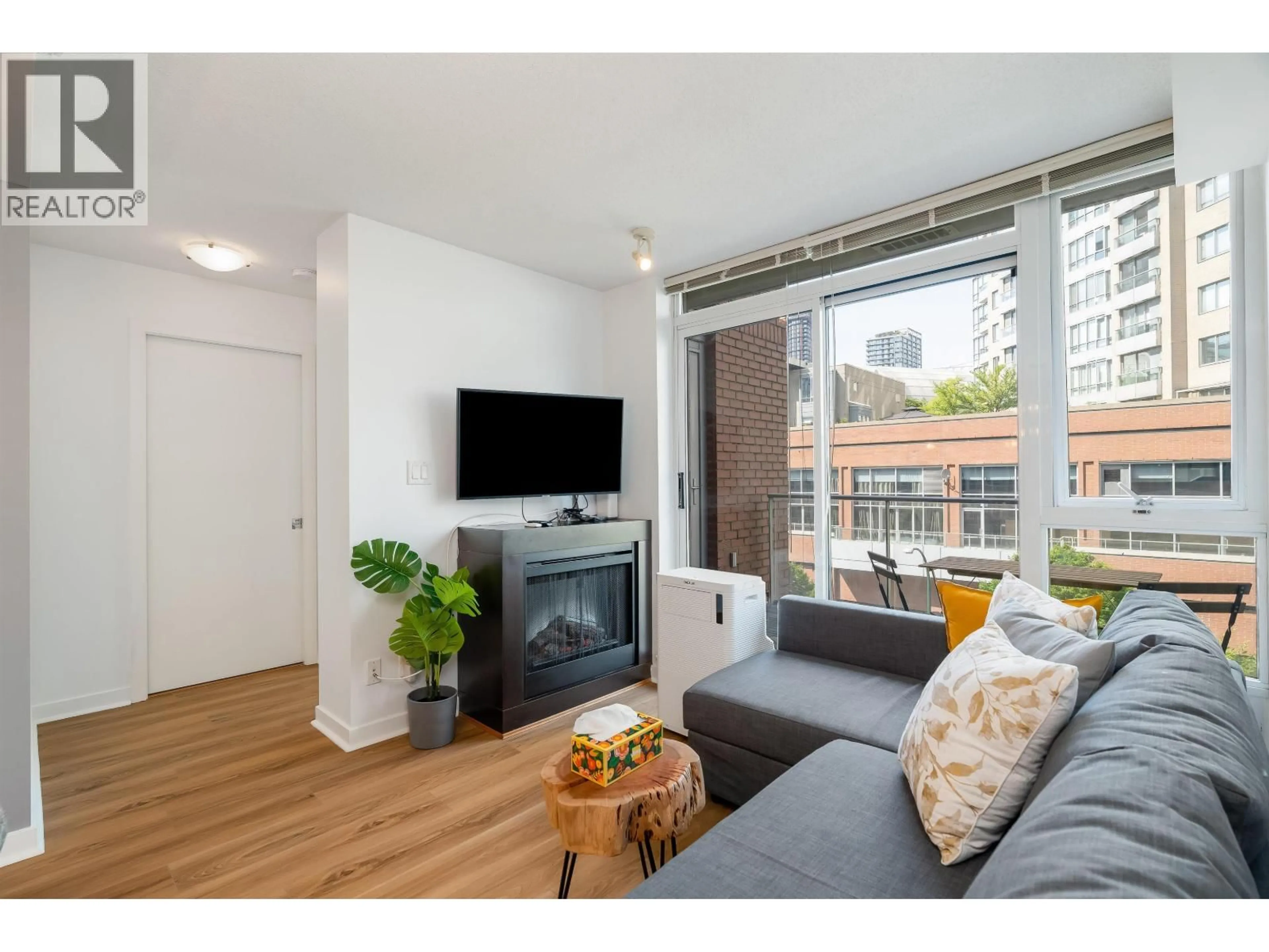 Living room with furniture, wood/laminate floor for 517 - 618 ABBOTT STREET, Vancouver British Columbia V6B0C1