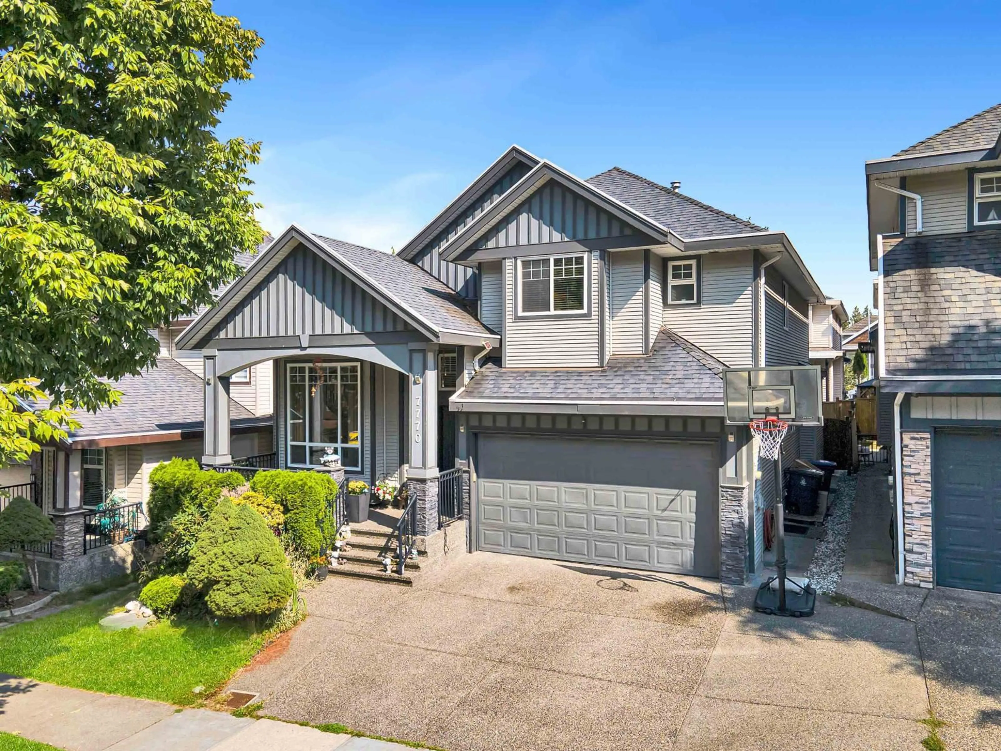 Home with vinyl exterior material, street for 7770 146, Surrey British Columbia V3S2T6