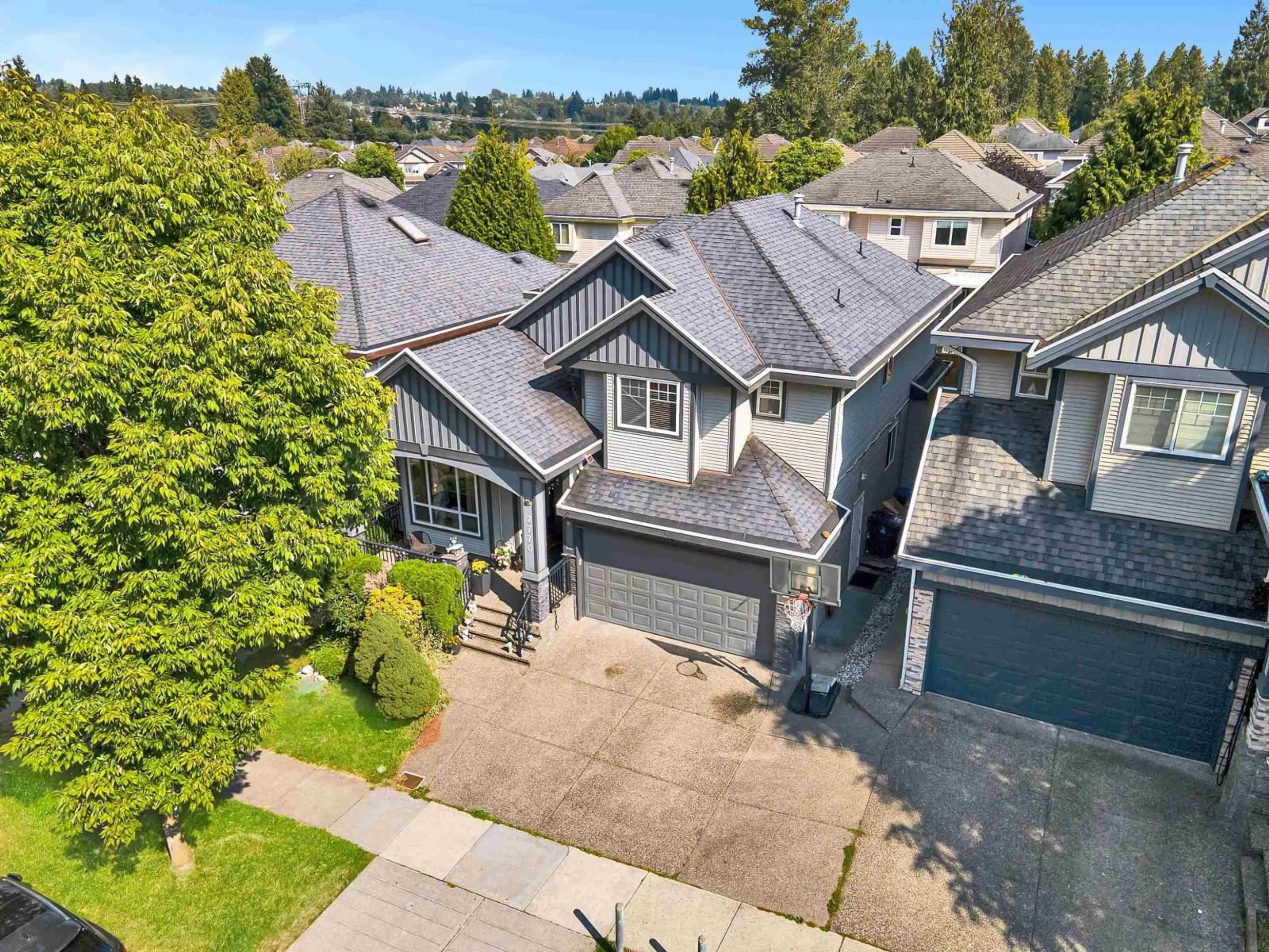 A pic from outside/outdoor area/front of a property/back of a property/a pic from drone, street for 7770 146, Surrey British Columbia V3S2T6