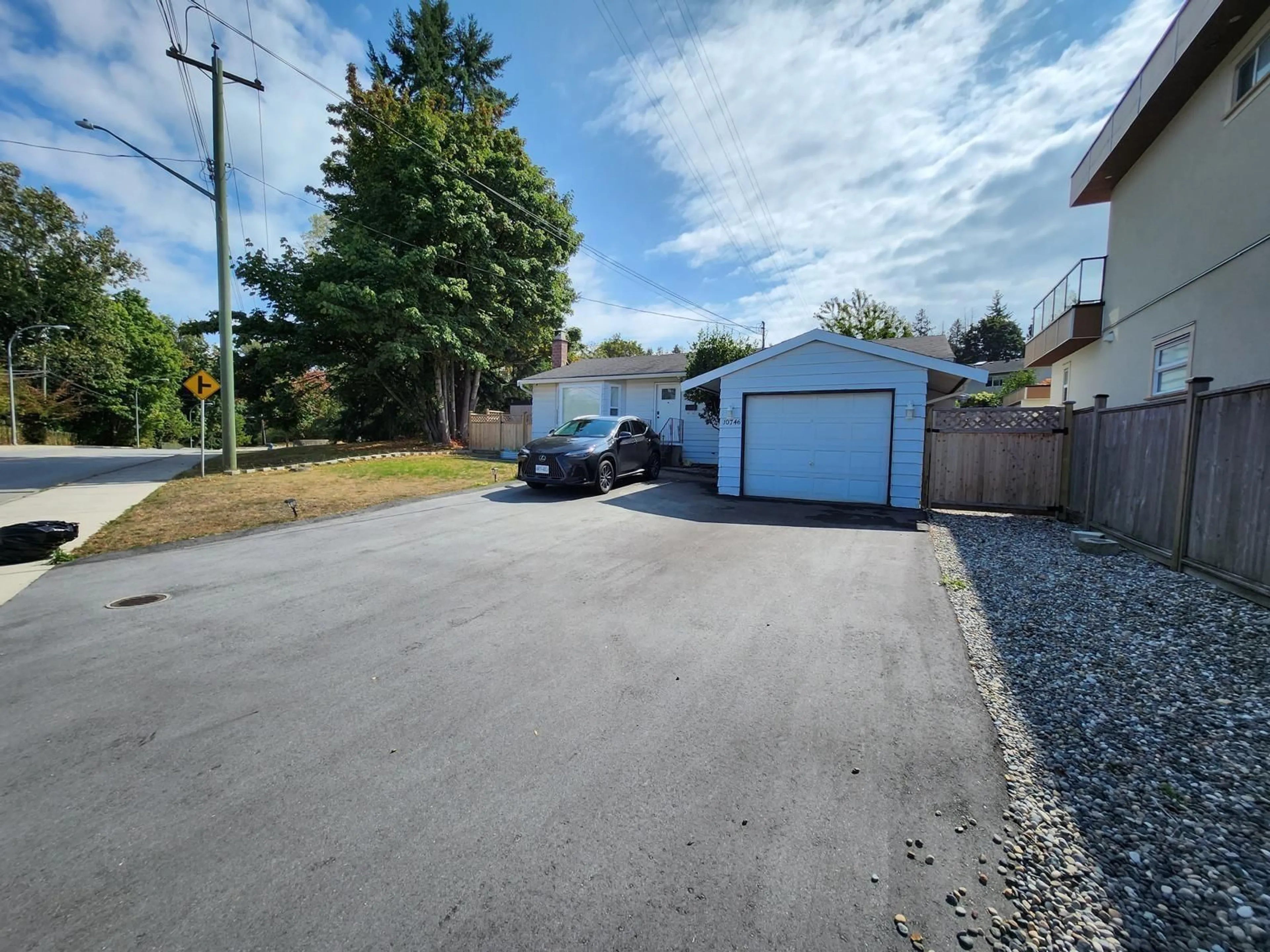 A pic from outside/outdoor area/front of a property/back of a property/a pic from drone, street for 10746 RIVER, Delta British Columbia V4C2R9