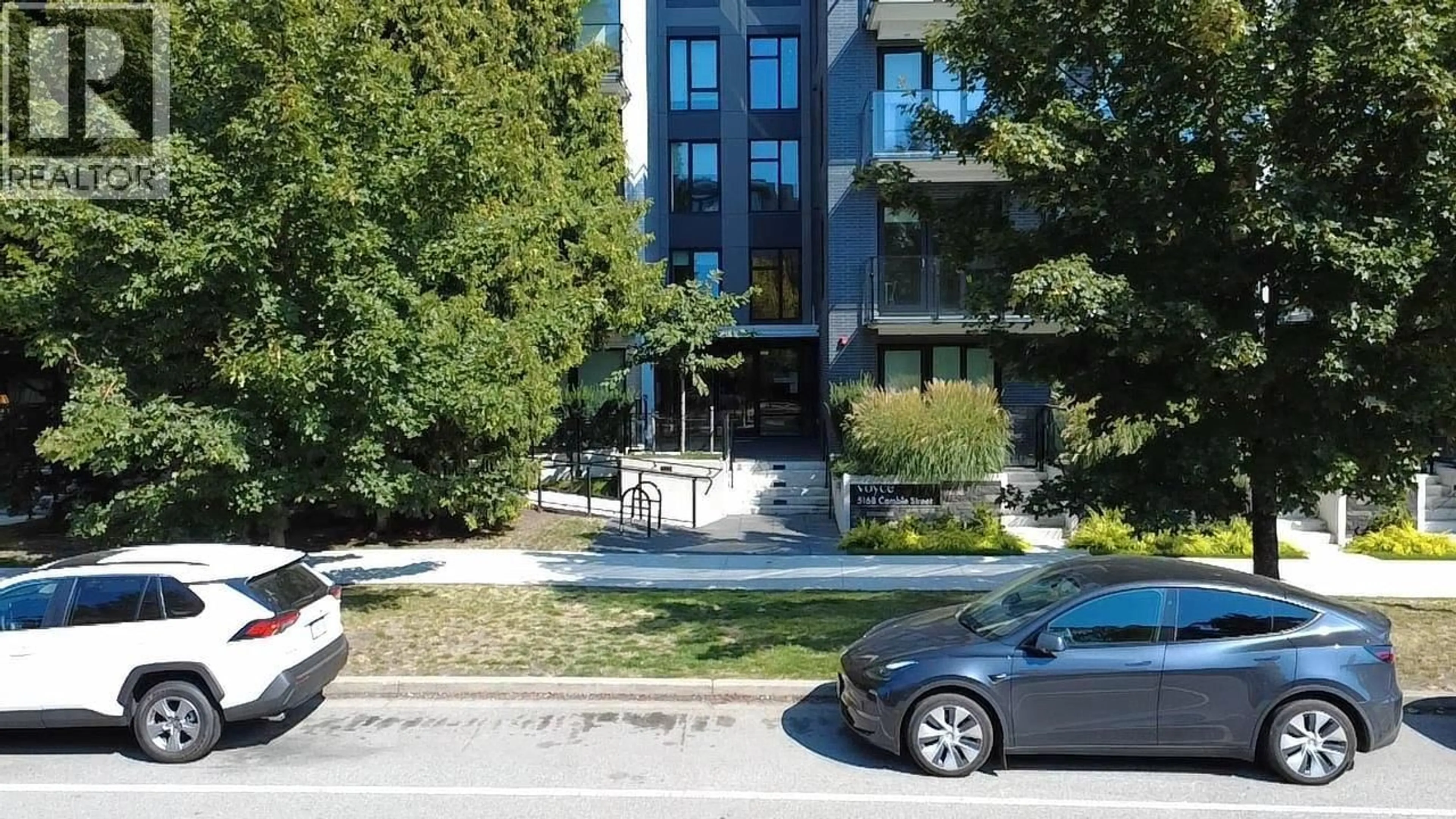 A pic from outside/outdoor area/front of a property/back of a property/a pic from drone, street for 210 - 5168 CAMBIE STREET, Vancouver British Columbia V5Z0K7