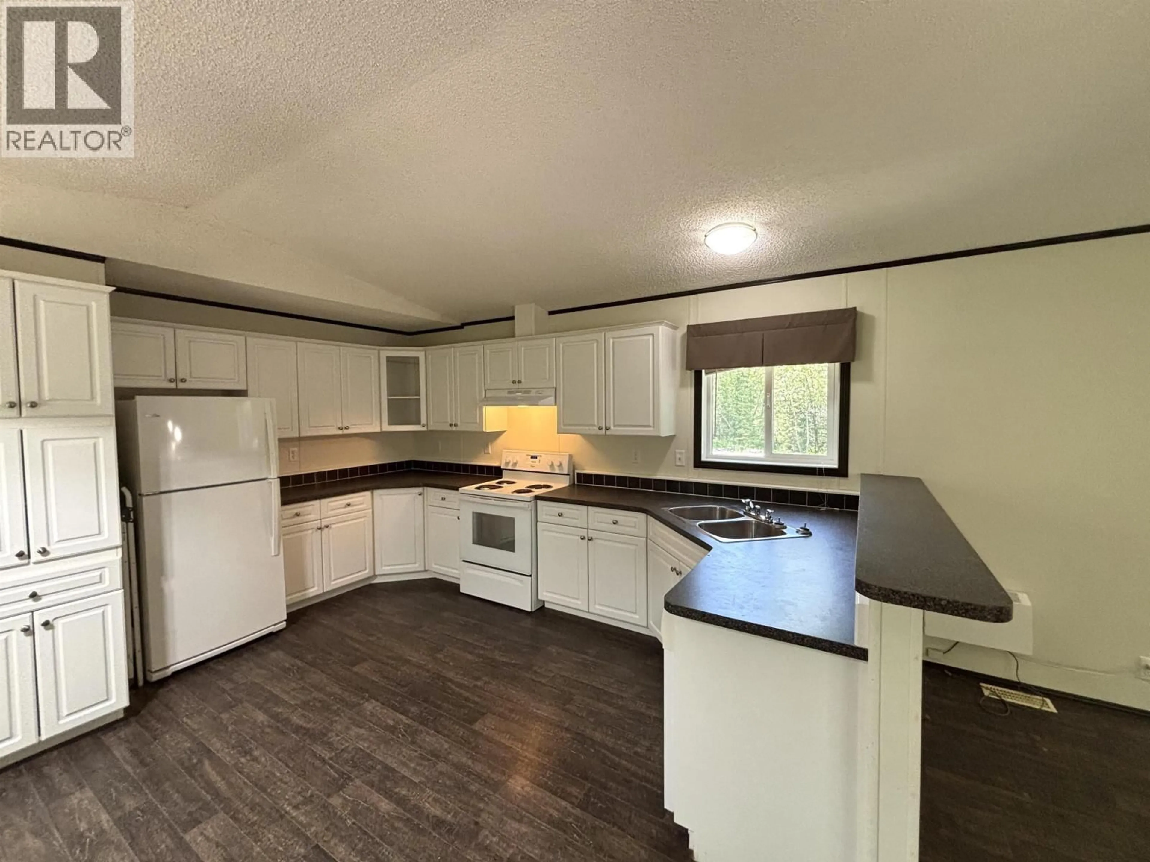 Open concept kitchen, wood/laminate floor for 10315 GLENMARY ROAD, Prince George British Columbia V2K5V8