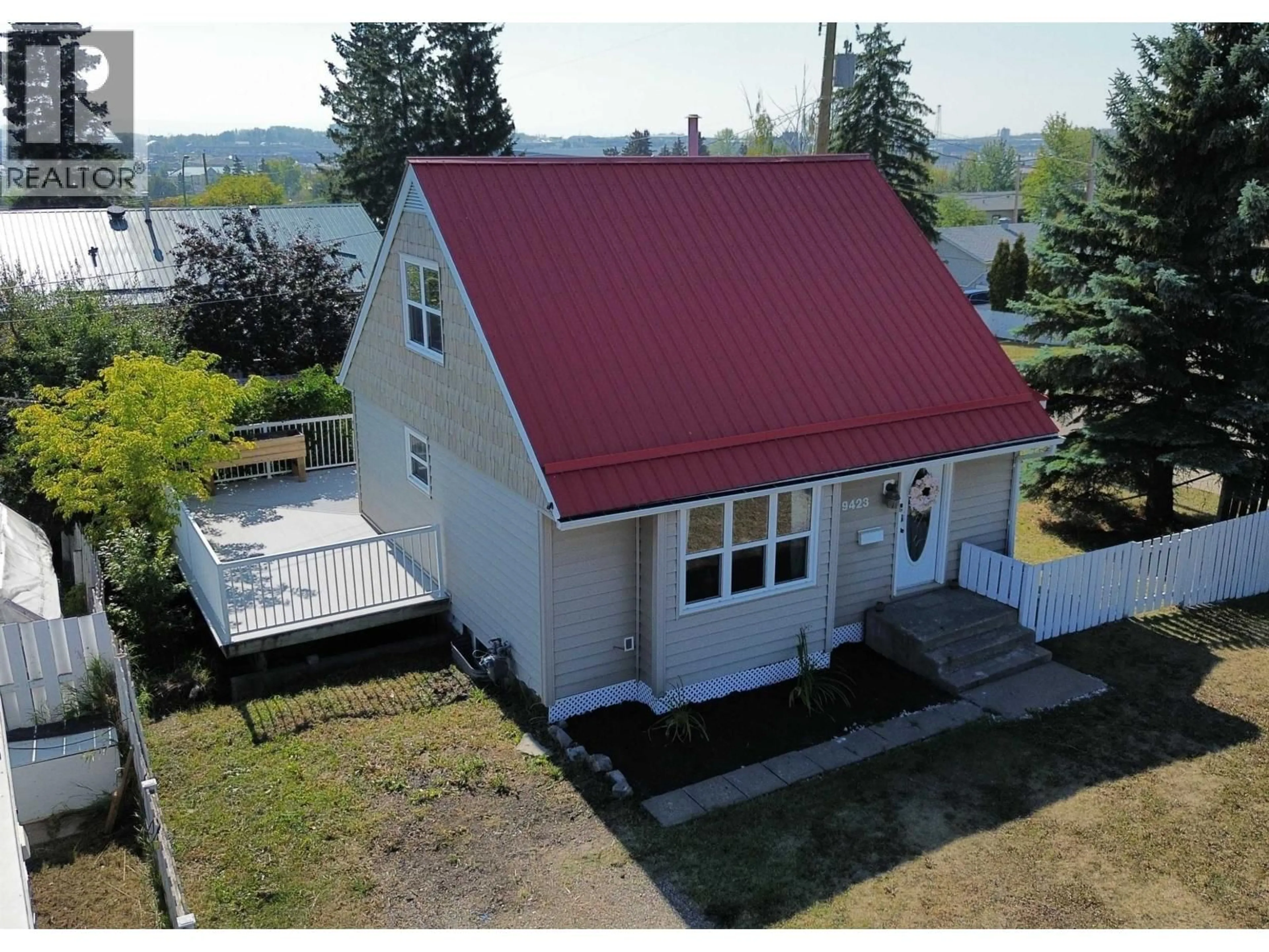 A pic from outside/outdoor area/front of a property/back of a property/a pic from drone, building for 9423 99 AVENUE, Fort St. John British Columbia V1J1T3
