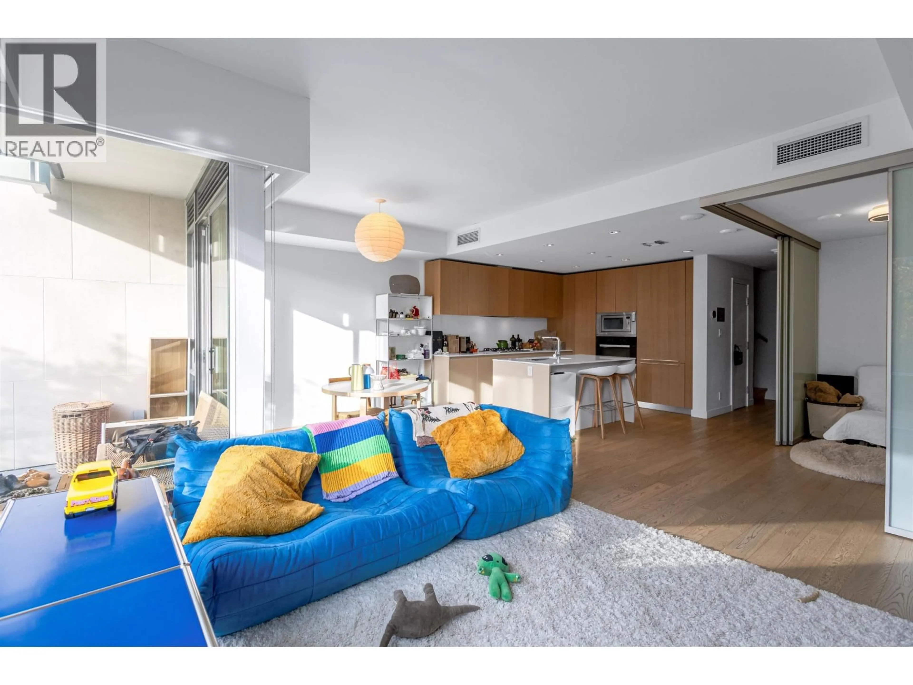 Living room with furniture, unknown for 104 - 6622 PEARSON WAY, Richmond British Columbia V7C0E4
