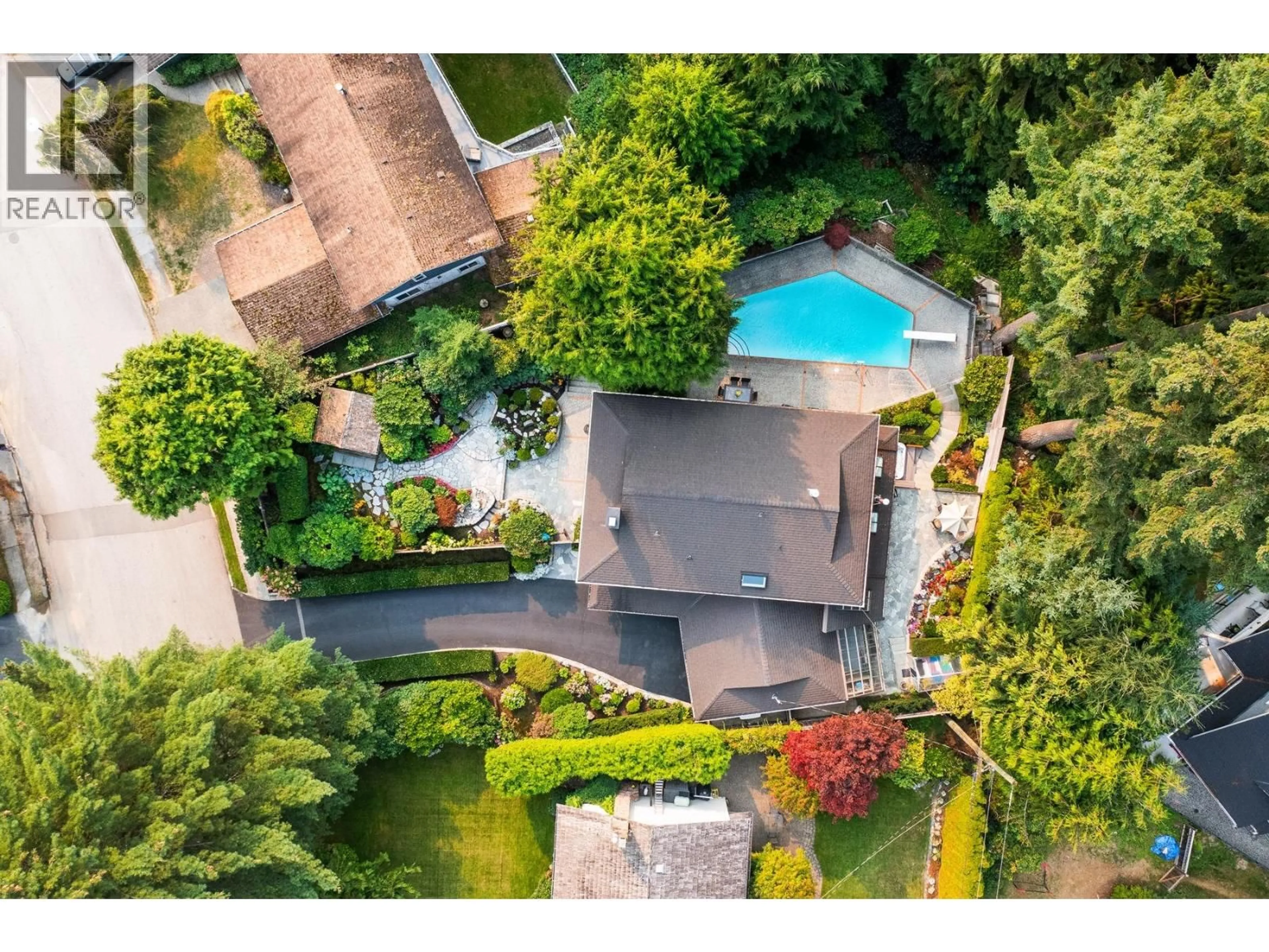A pic from outside/outdoor area/front of a property/back of a property/a pic from drone, street for 4423 PATTERDALE DRIVE, North Vancouver British Columbia V7R4L6