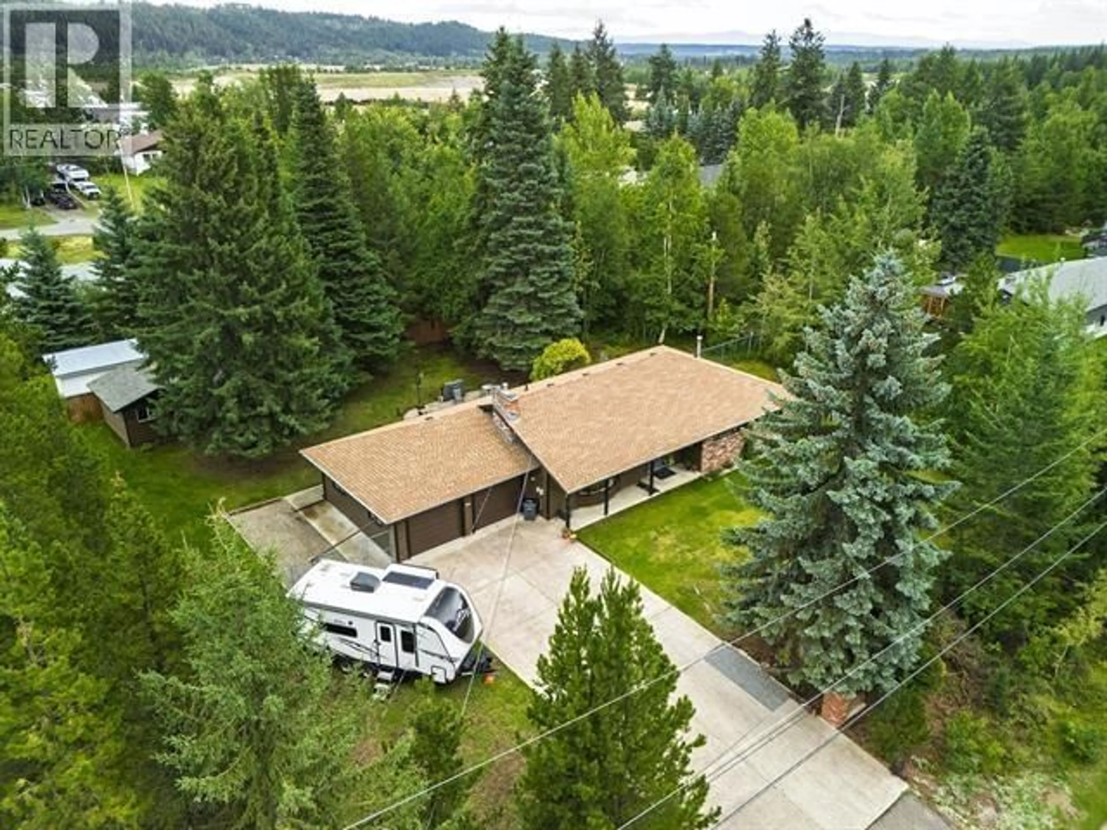 A pic from outside/outdoor area/front of a property/back of a property/a pic from drone, unknown for 5912 RIVERDALE CRESCENT, Prince George British Columbia V2K4Y7