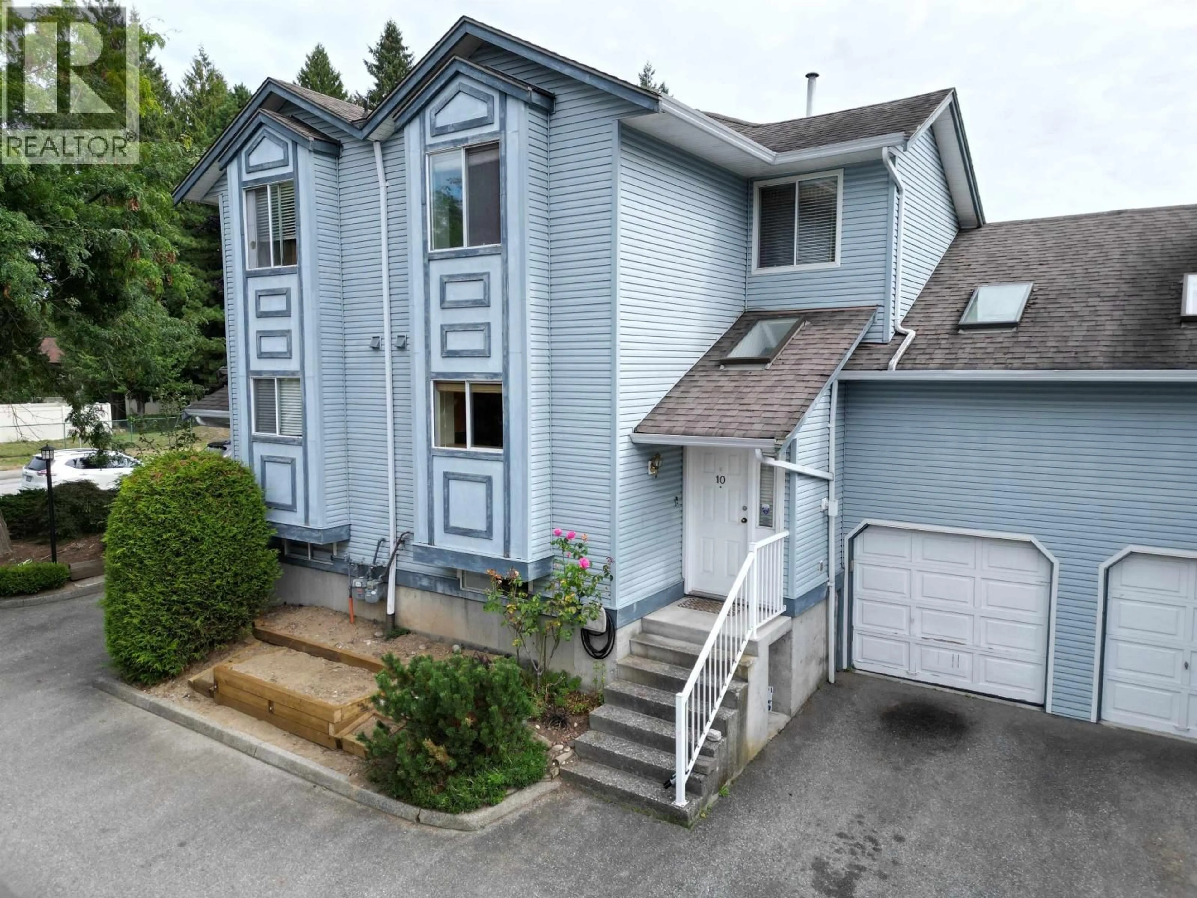 A pic from outside/outdoor area/front of a property/back of a property/a pic from drone, street for 10 - 19252 119TH AVENUE, Pitt Meadows British Columbia V3Y2K4