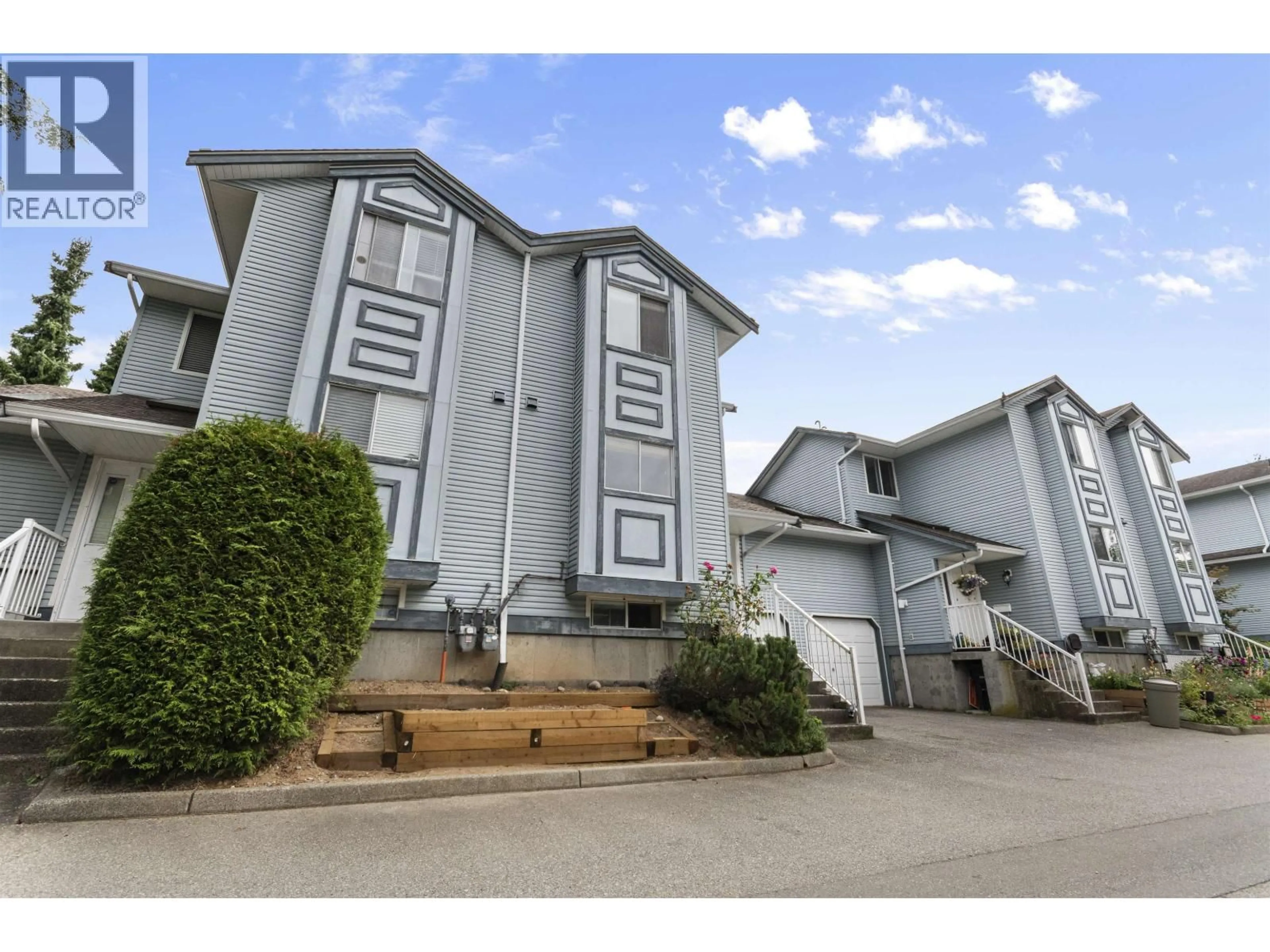 A pic from outside/outdoor area/front of a property/back of a property/a pic from drone, street for 10 - 19252 119TH AVENUE, Pitt Meadows British Columbia V3Y2K4