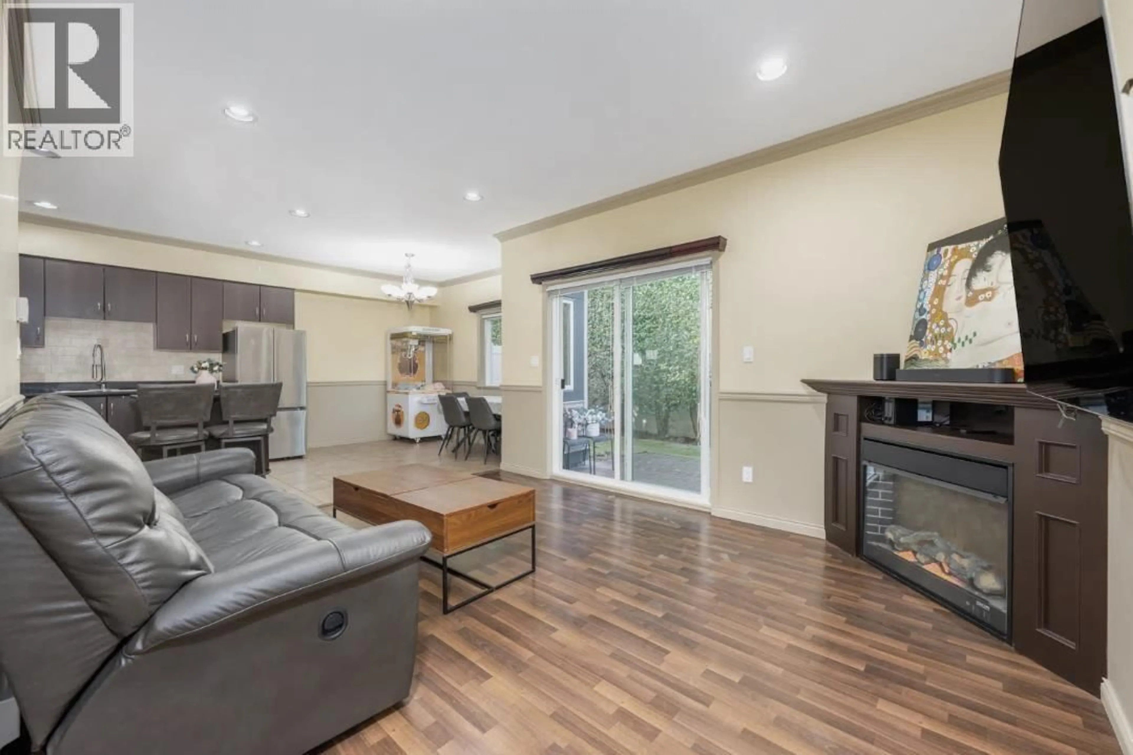 Living room with furniture, unknown for 14 - 7071 BRIDGE STREET, Richmond British Columbia V6Y2S6