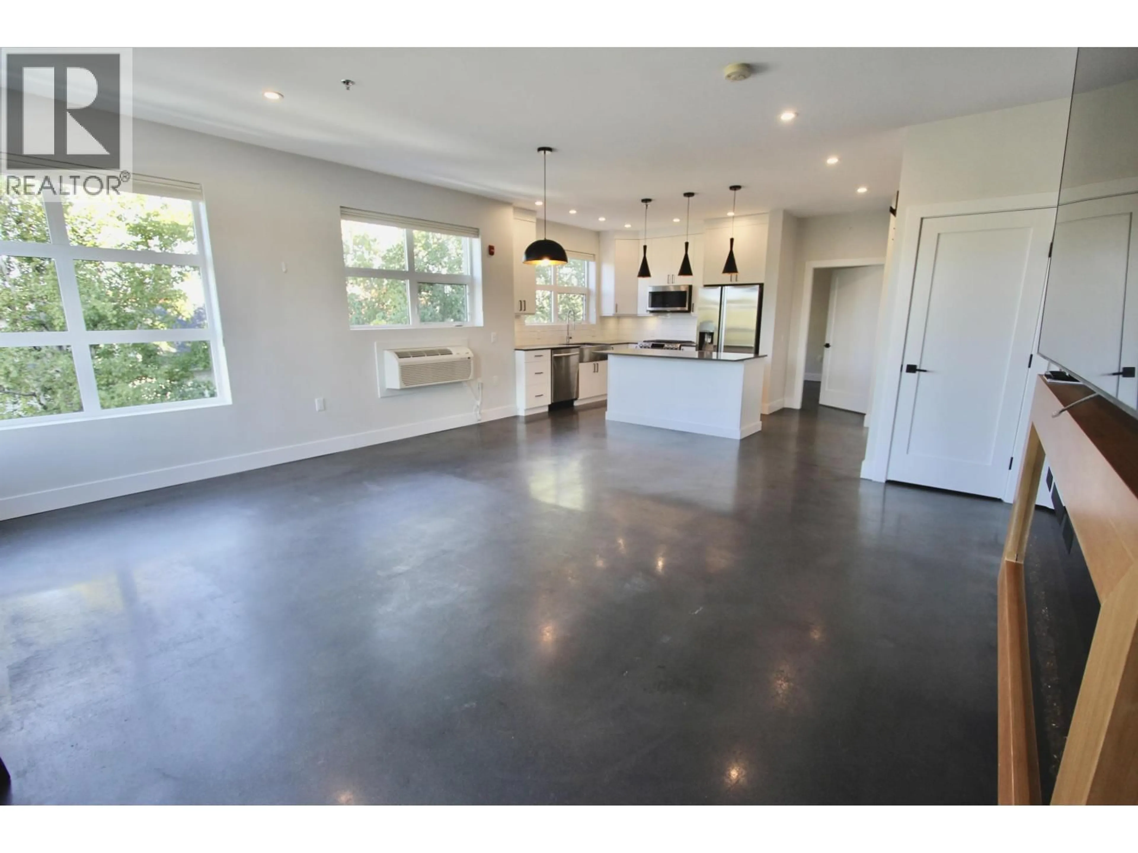 Open concept kitchen, unknown for 201 - 1694 7TH AVENUE, Prince George British Columbia V2L3P6
