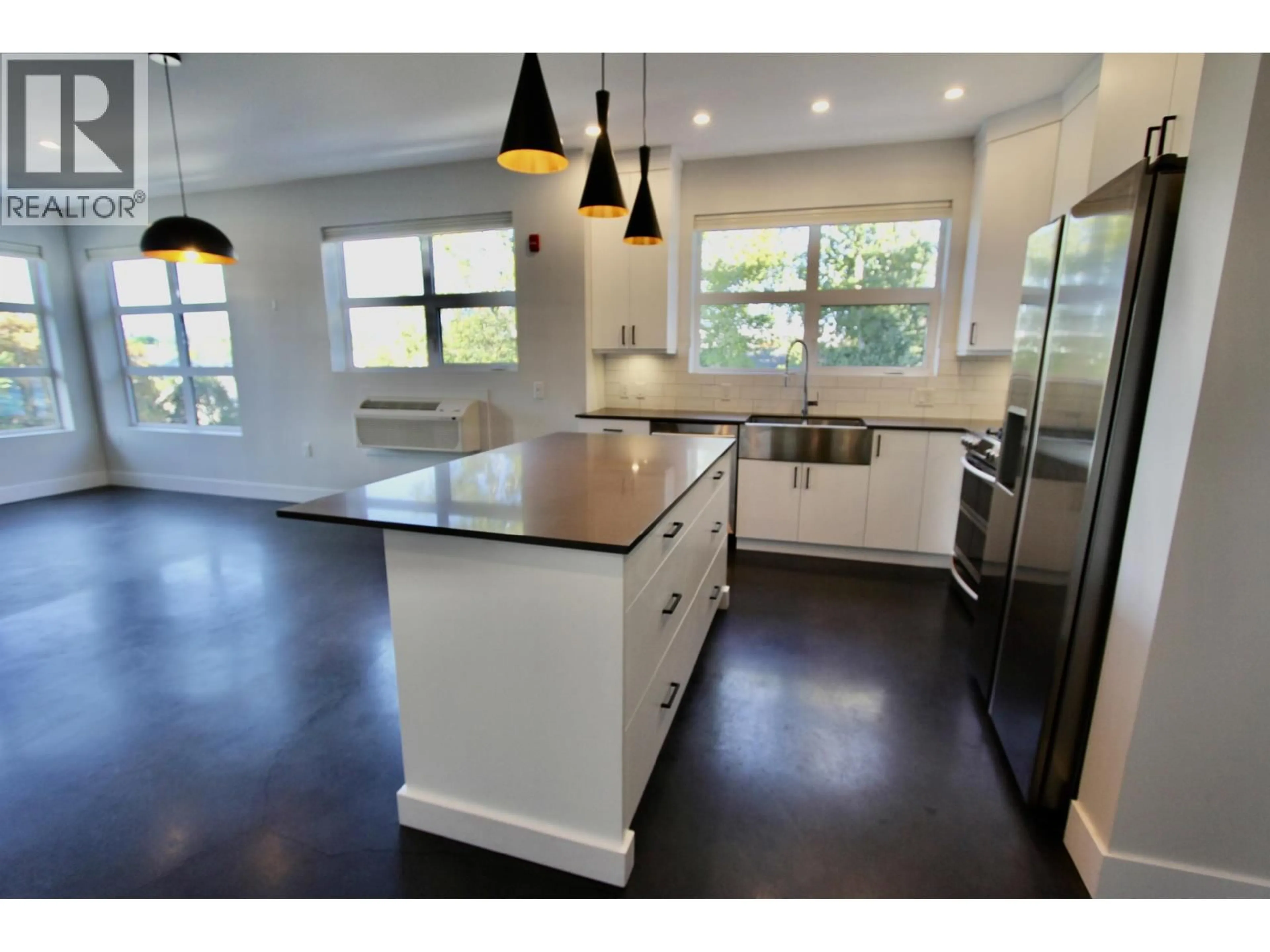 Open concept kitchen, unknown for 201 - 1694 7TH AVENUE, Prince George British Columbia V2L3P6