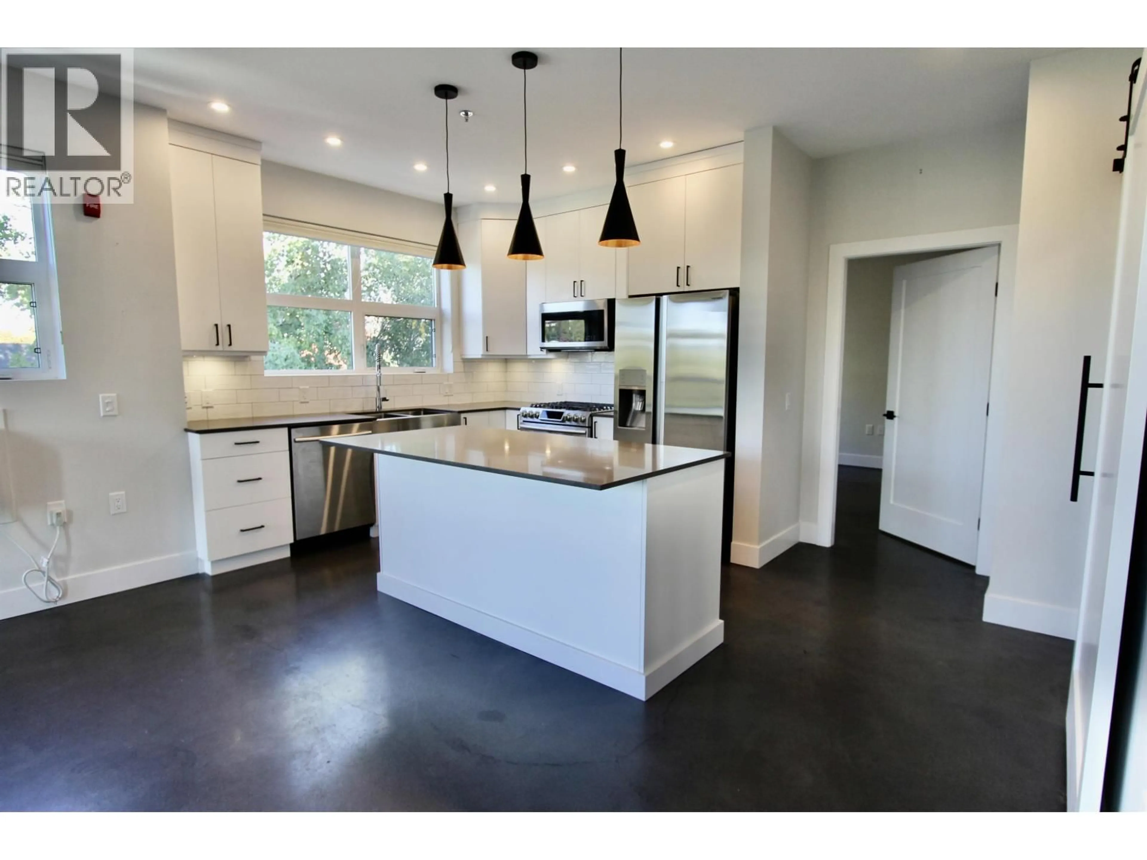 Open concept kitchen, unknown for 201 - 1694 7TH AVENUE, Prince George British Columbia V2L3P6